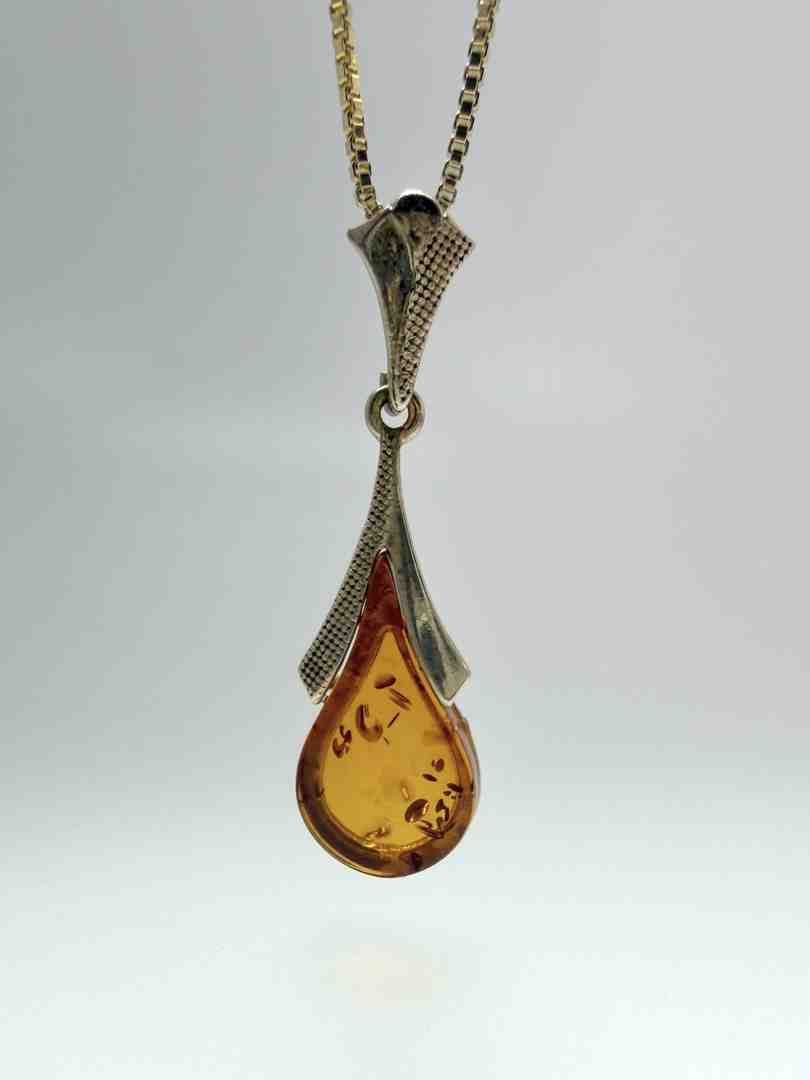 Don't Be Jaded: Why a Bezel Set Amber Necklace is the Real Gem