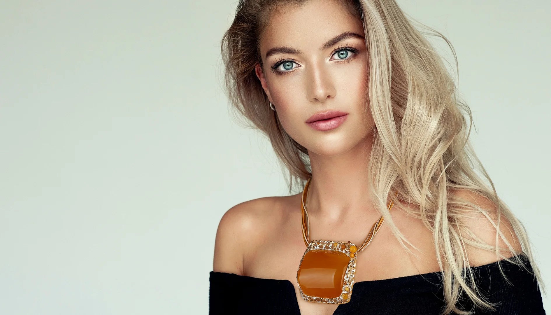How to Style an Amber Necklace Without Looking Like a Fossil