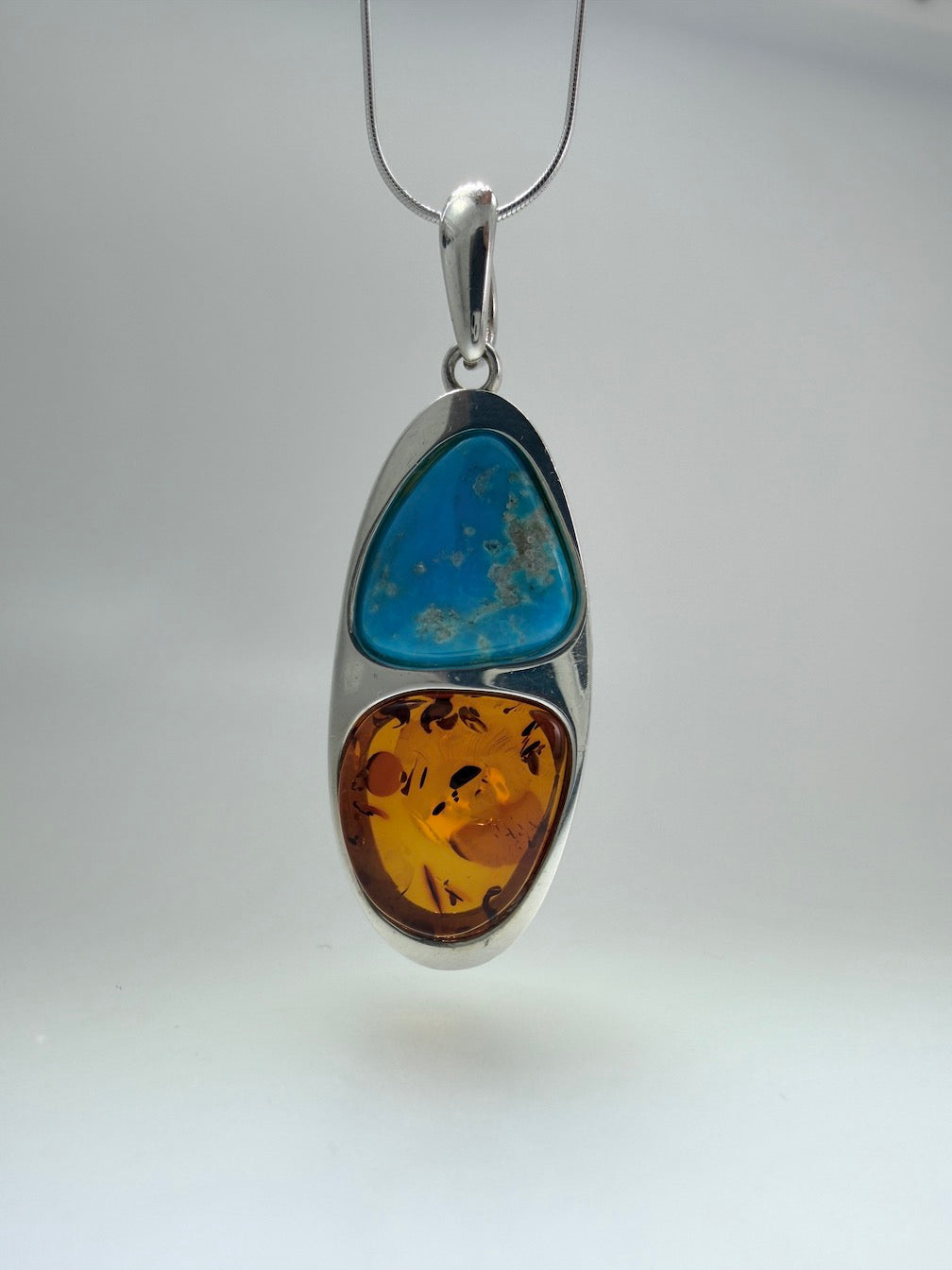 Baltic Amber & Sleeping Beauty Turquoise Pendant – Sterling Silver – Modern Two-Stone Design – Made in Poland