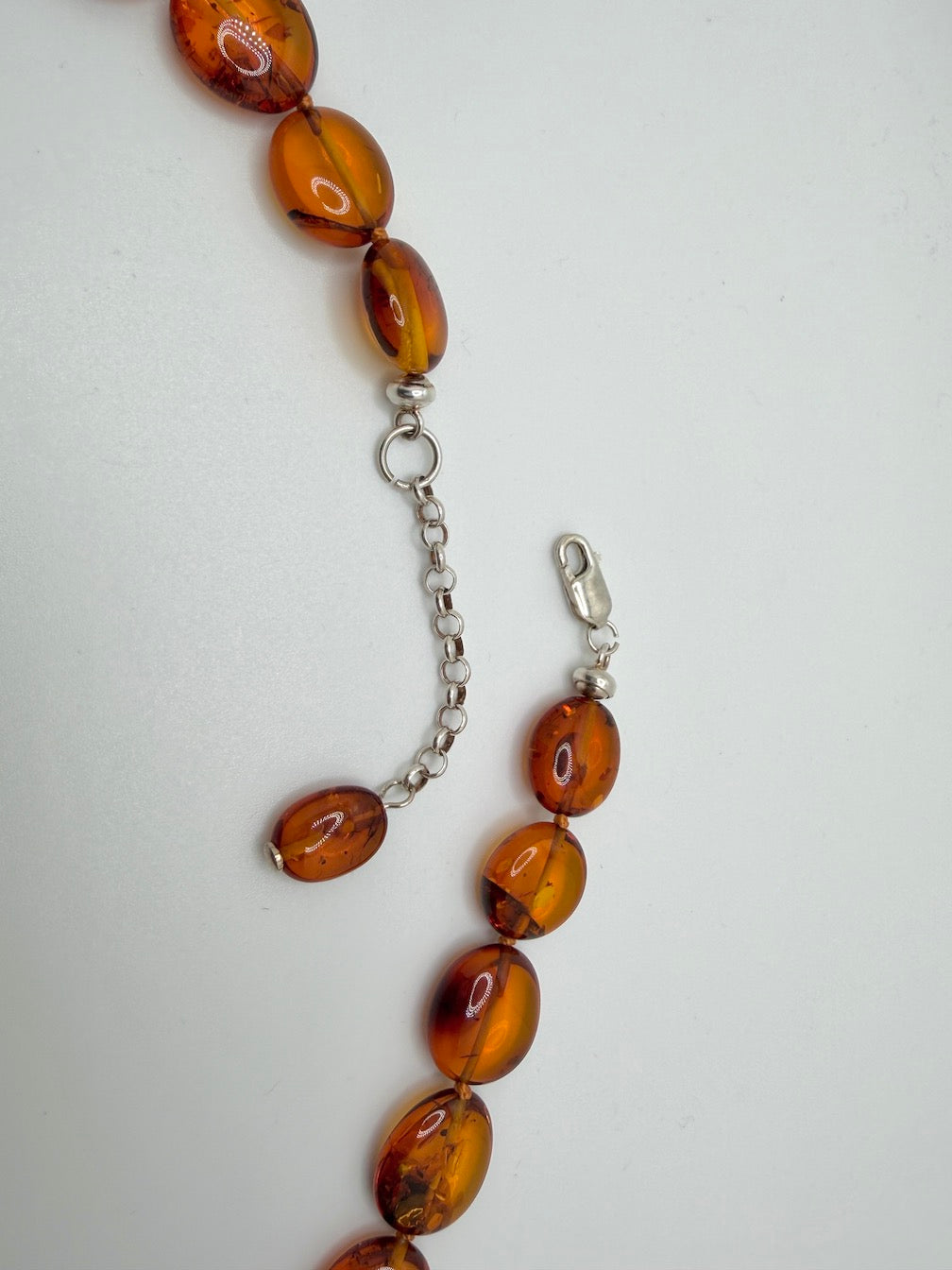 Genuine Baltic Amber Necklace • Cognac Oval Beads • Graduated Strand • Handmade • Sterling Silver Clasp