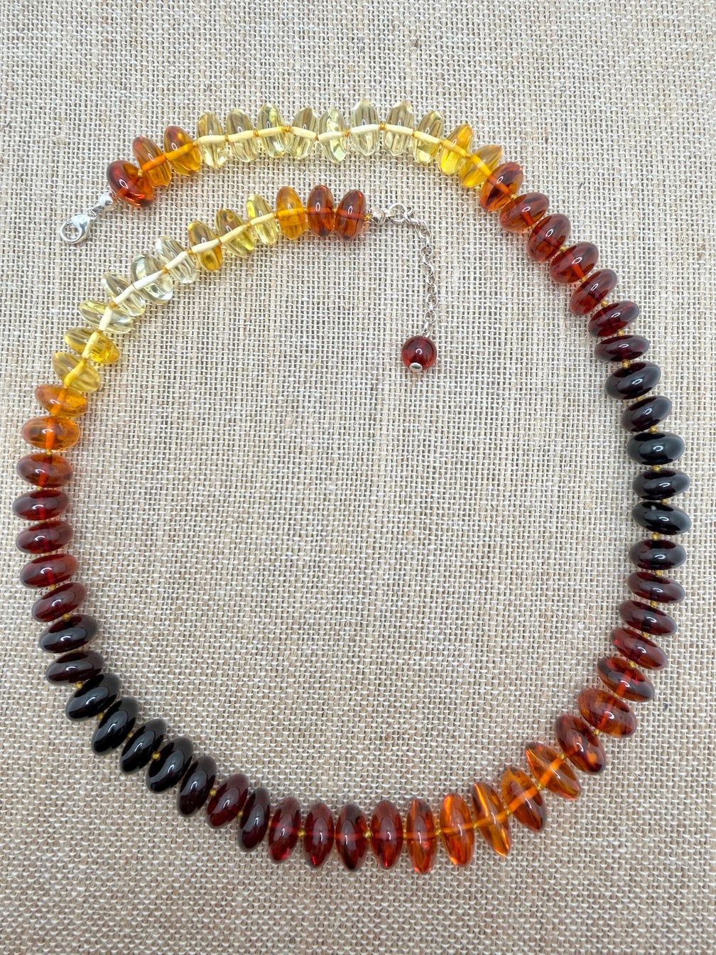 Museum Quality Rainbow Multicolor Ombré Baltic Amber Donut Bead Necklace – 22 Inch Graduated Strand