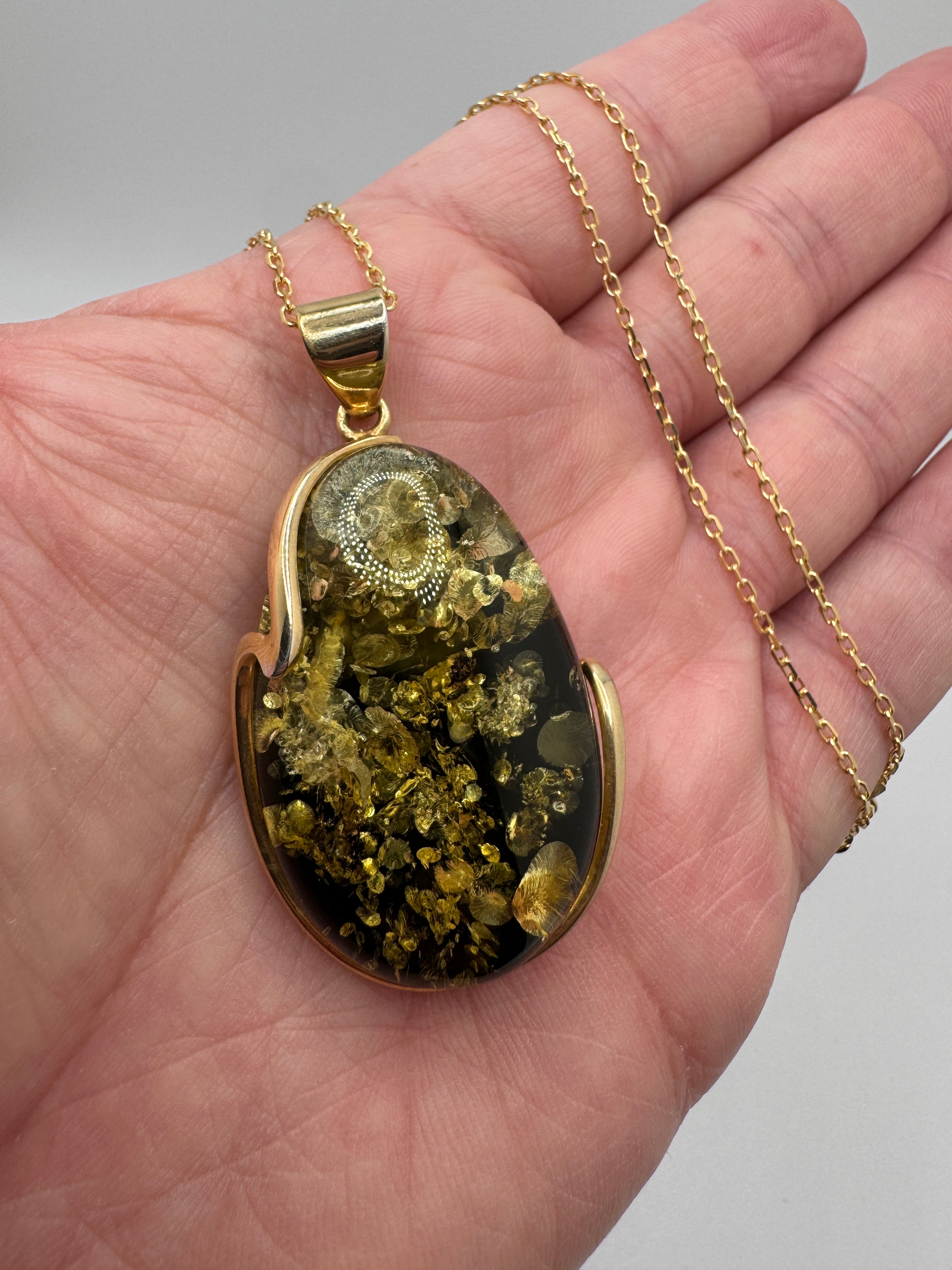 Green Baltic Amber Hand Made Pendant set in Gold Platted Sterling Silver on Snake Chain