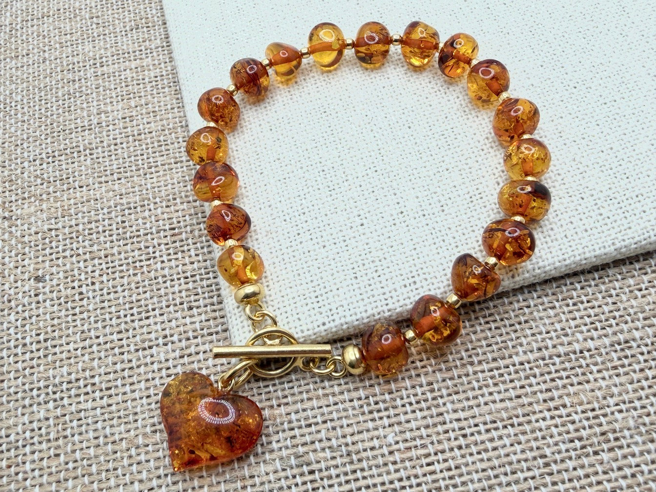 Handmade Honey Baltic Amber Bead Bracelet with Heart Charm – Genuine Baltic Amber & Gold Plated Sterling Silver Toggle