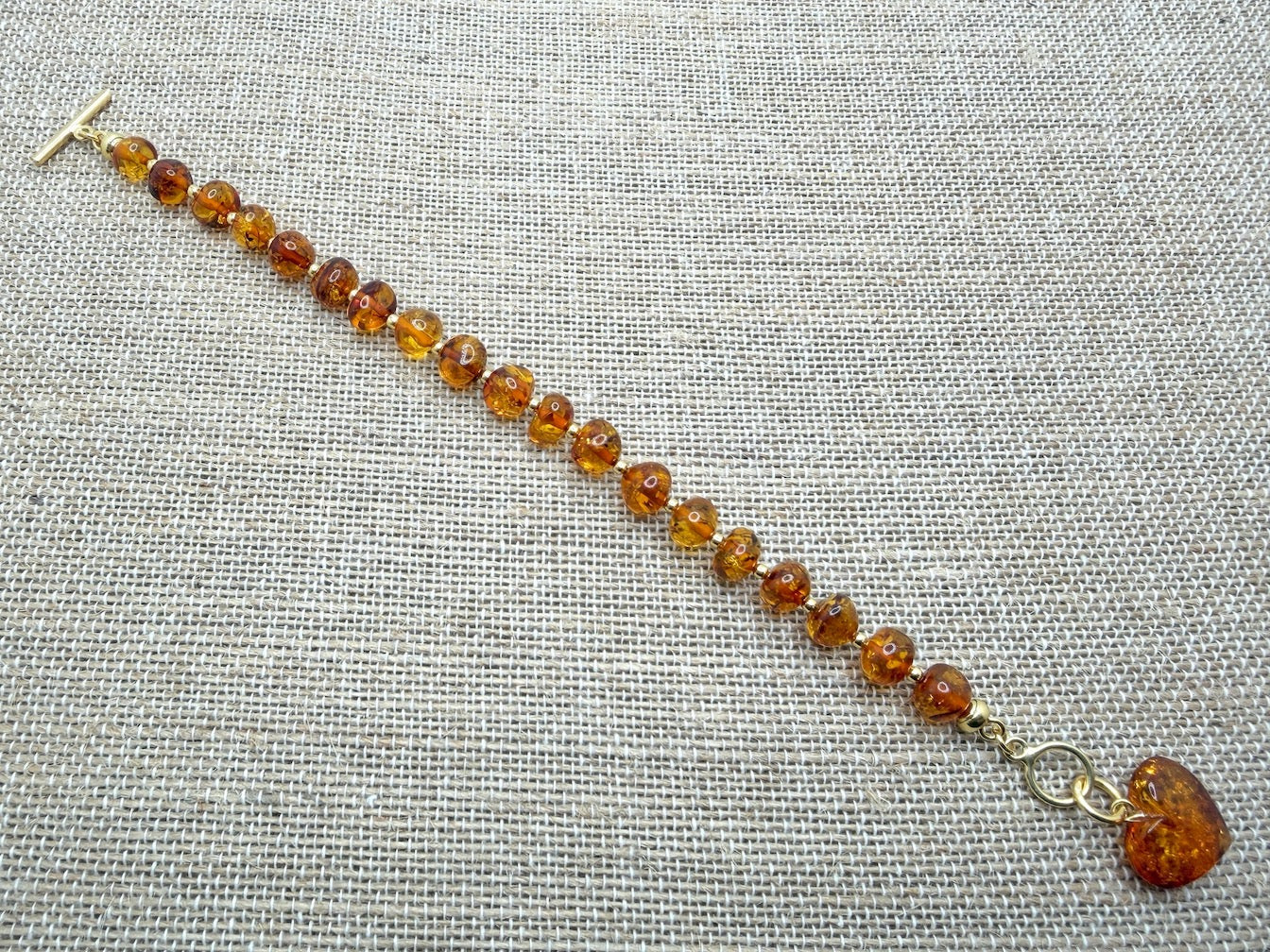 Handmade Honey Baltic Amber Bead Bracelet with Heart Charm – Genuine Baltic Amber & Gold Plated Sterling Silver Toggle
