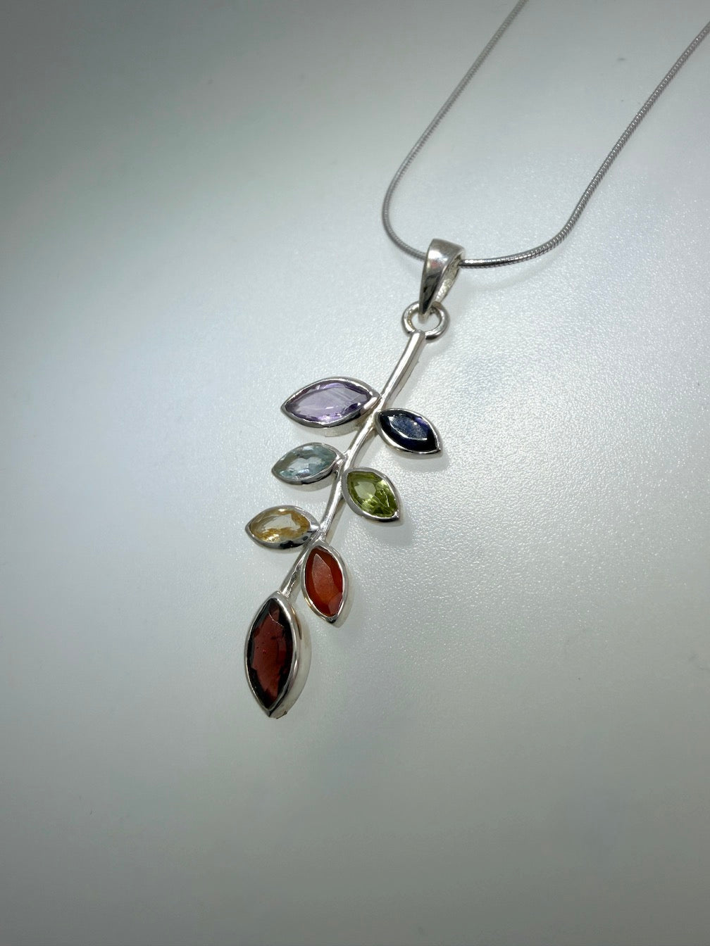 Multi-Stone Leaf Pendant Necklace – Sterling Silver with Amethyst, Blue Topaz, Peridot, Aquamarine & Quartz – Elegant Nature Inspired Jewelry