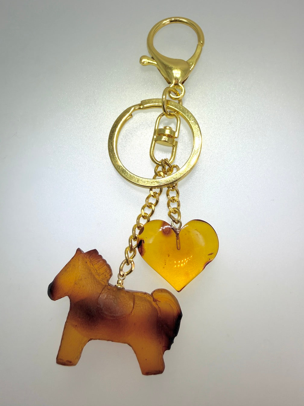 Handmade in Lithuania Genuine Baltic Amber Horse and Leaf Purse Charm – Elegant Laser-Cut Accent