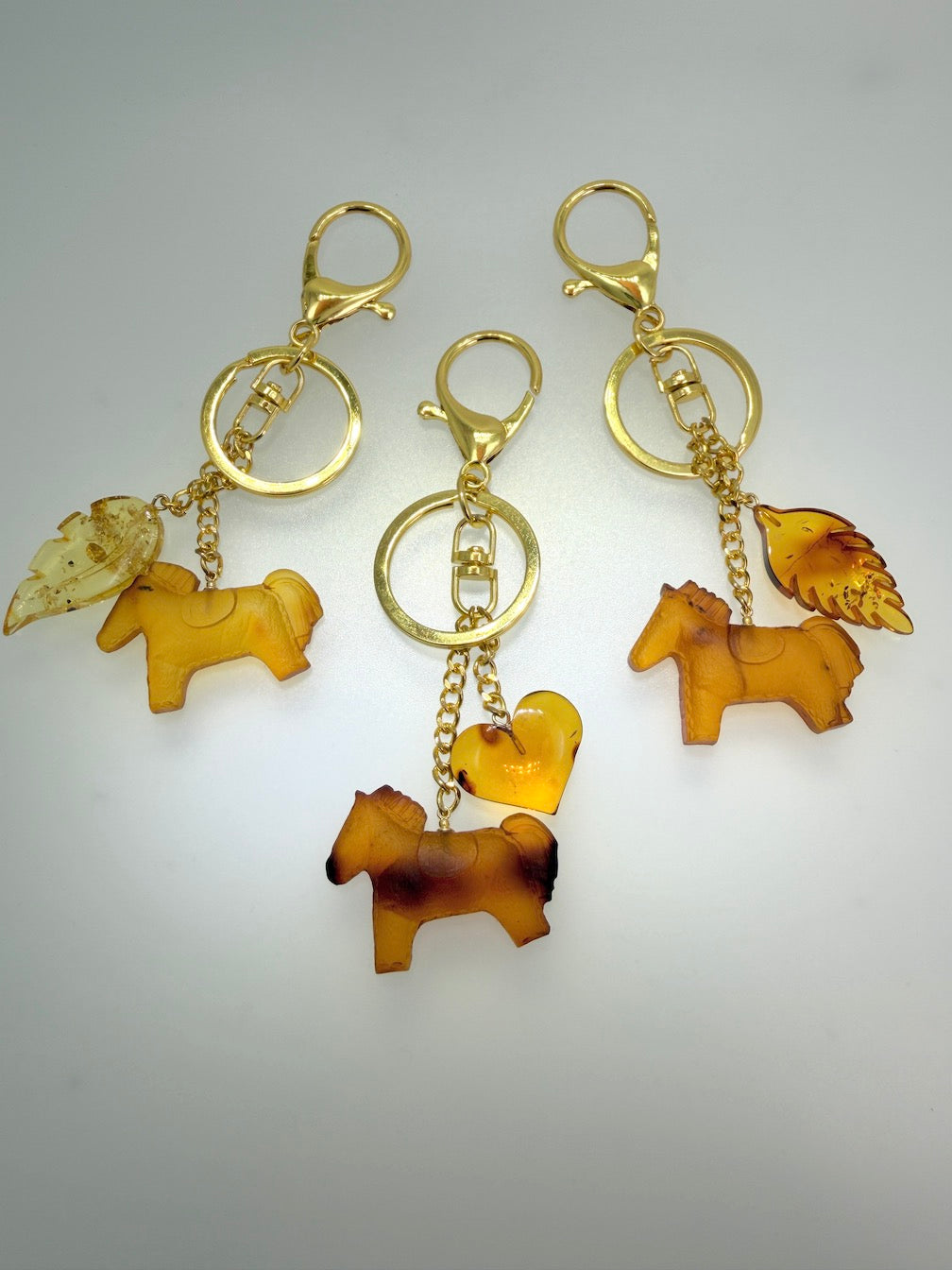 Handmade in Lithuania Genuine Baltic Amber Horse and Leaf Purse Charm – Elegant Laser-Cut Accent