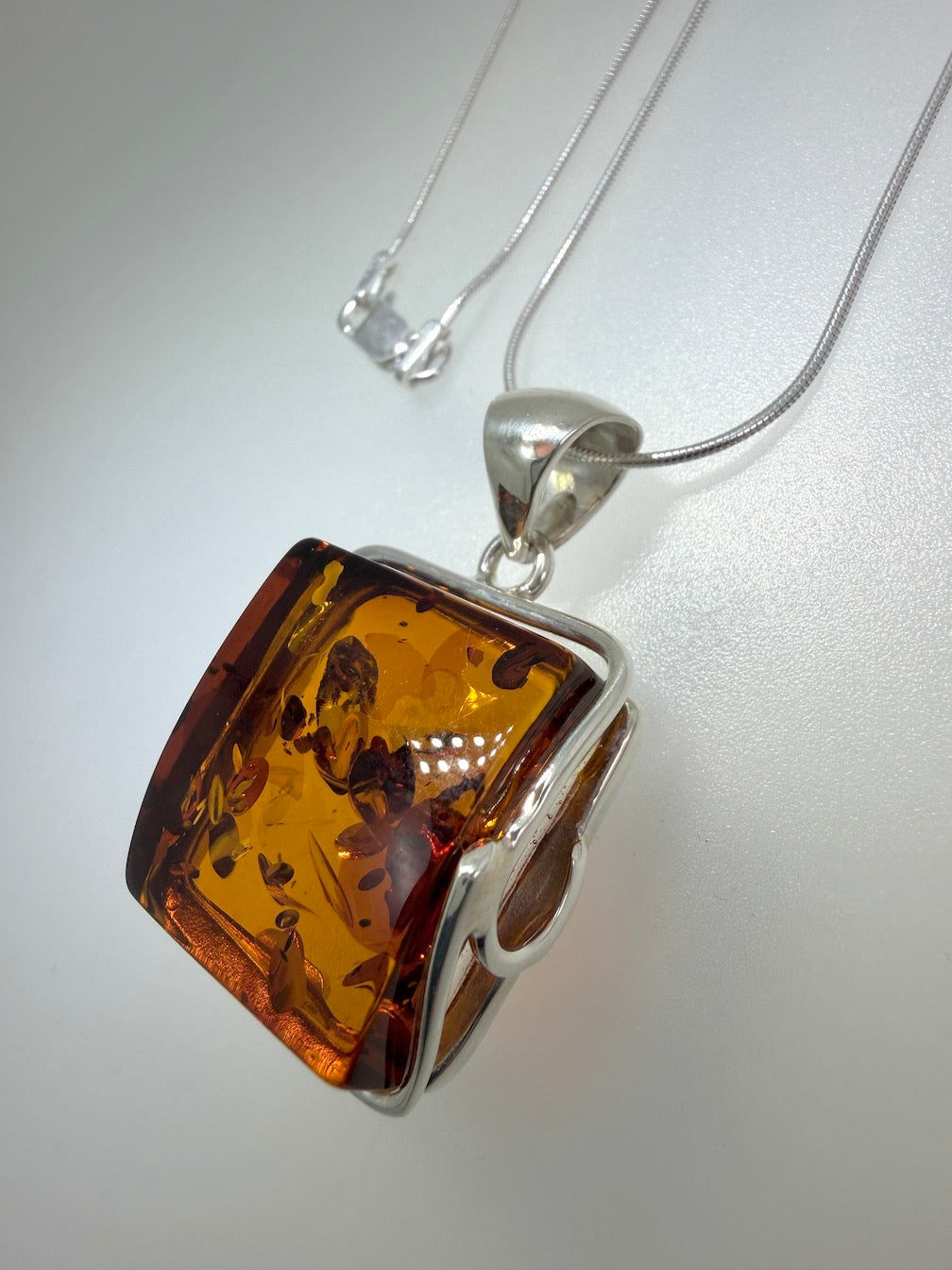 Handmade in Poland Modern Contemporary Sterling Silver Rectangular Pendant with Genuine Cognac Baltic Amber