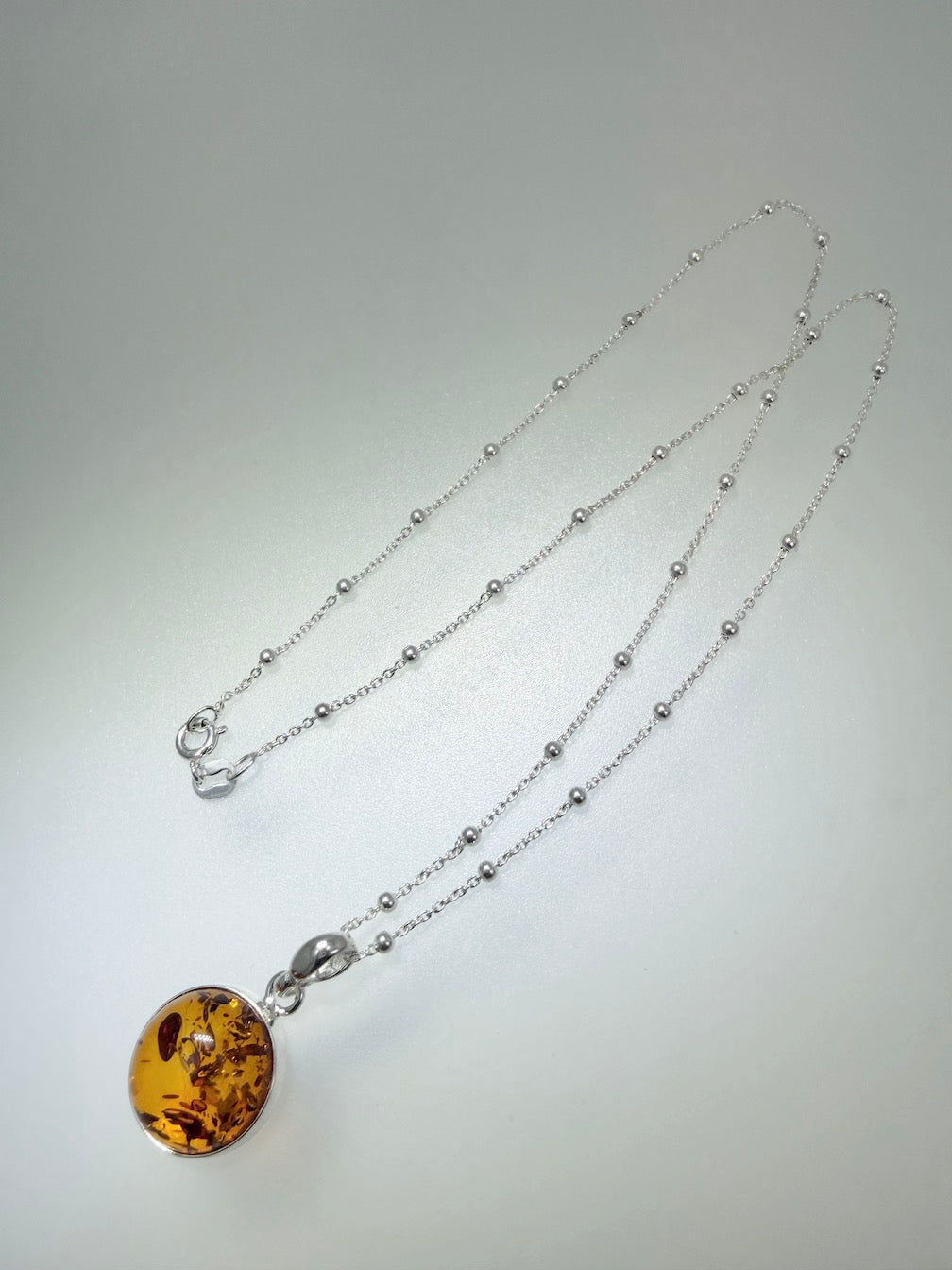 Honey Baltic Amber Round Pendant — Sterling Silver • Handmade in Poland