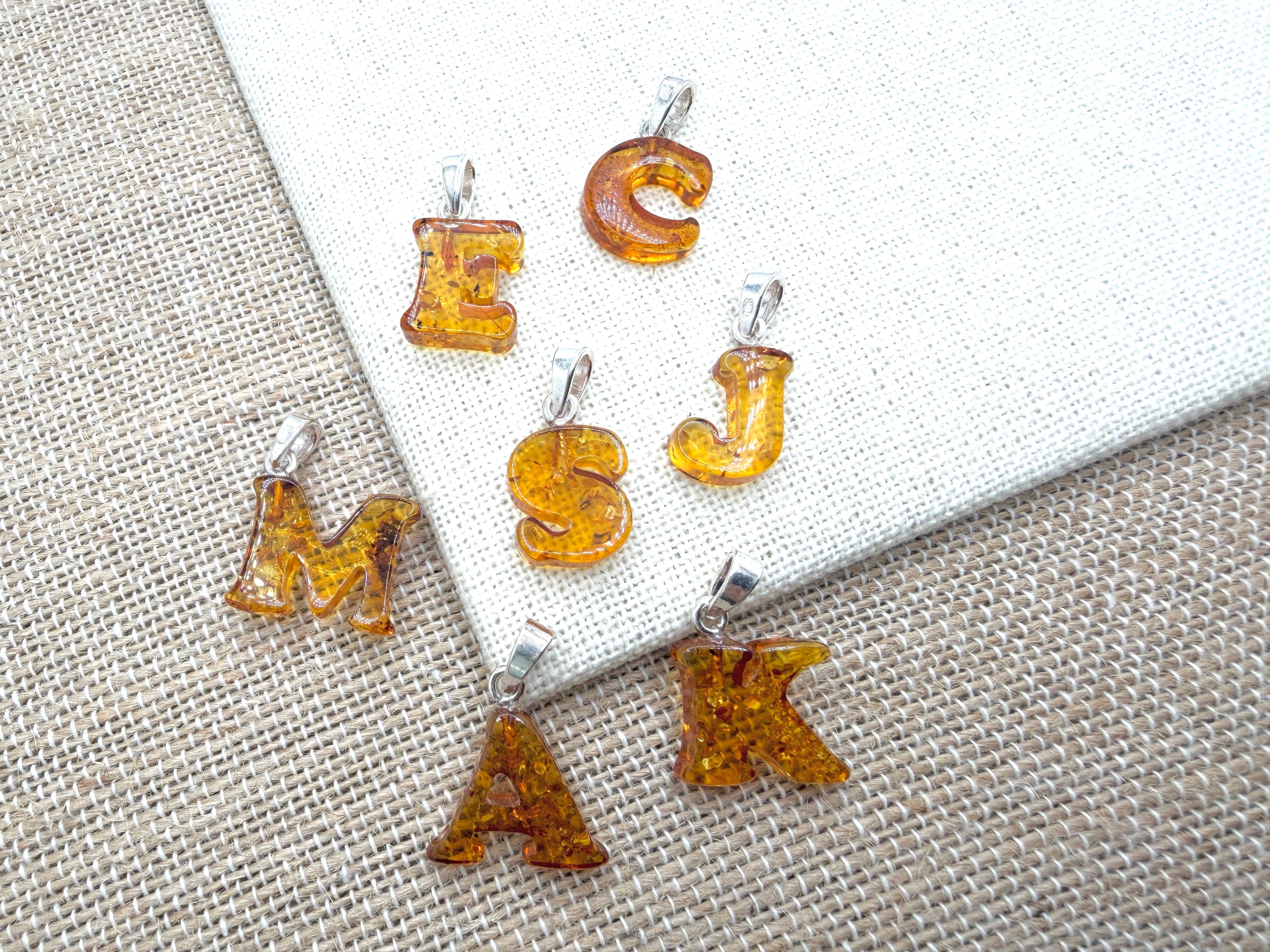 Personalized Baltic Amber Initial Pendant – Handcarved from one stone - shipped on choice of silver chain.