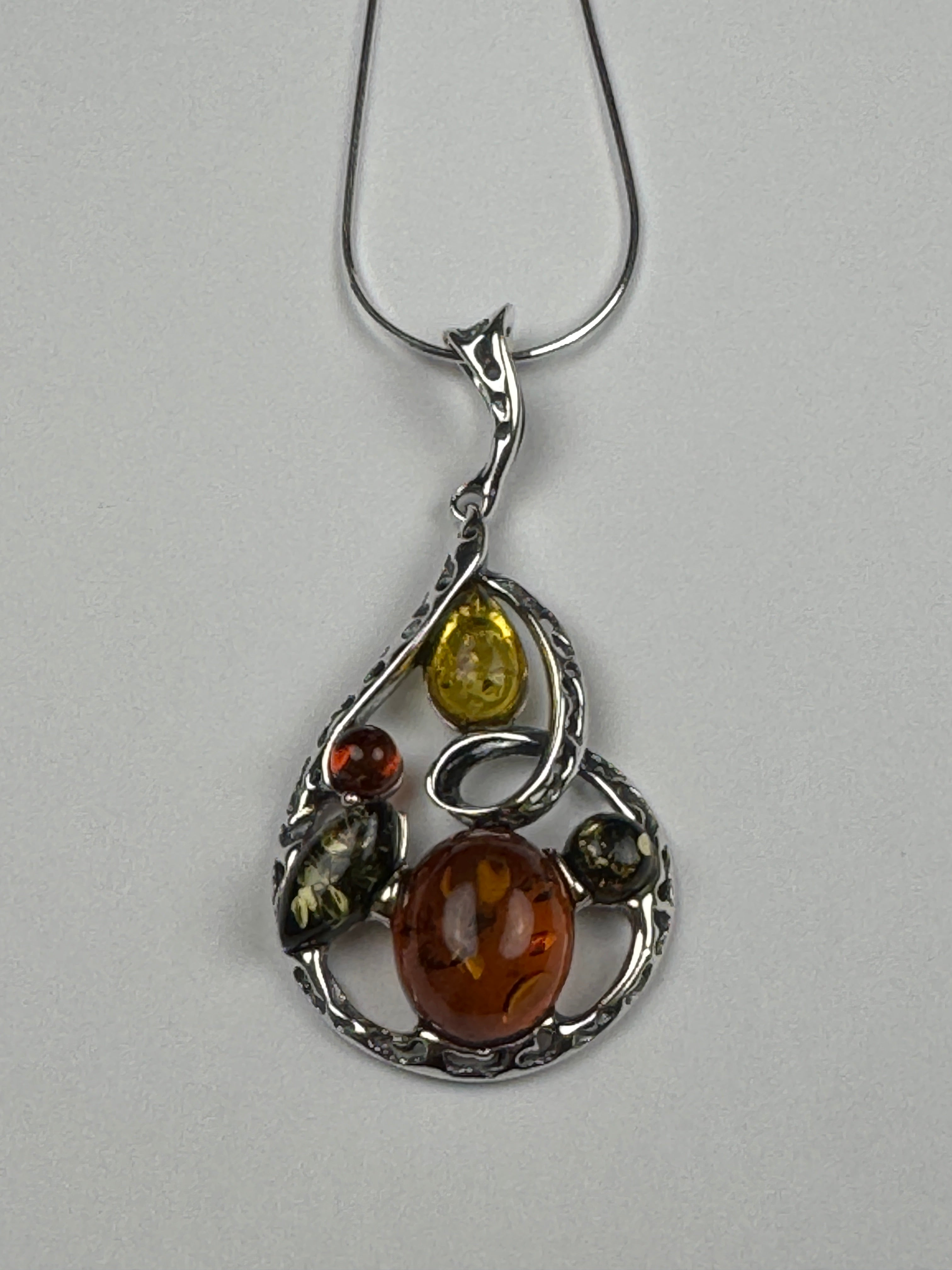 Artisan Multicolor Baltic Amber Pendant in Oxidized Sterling Silver