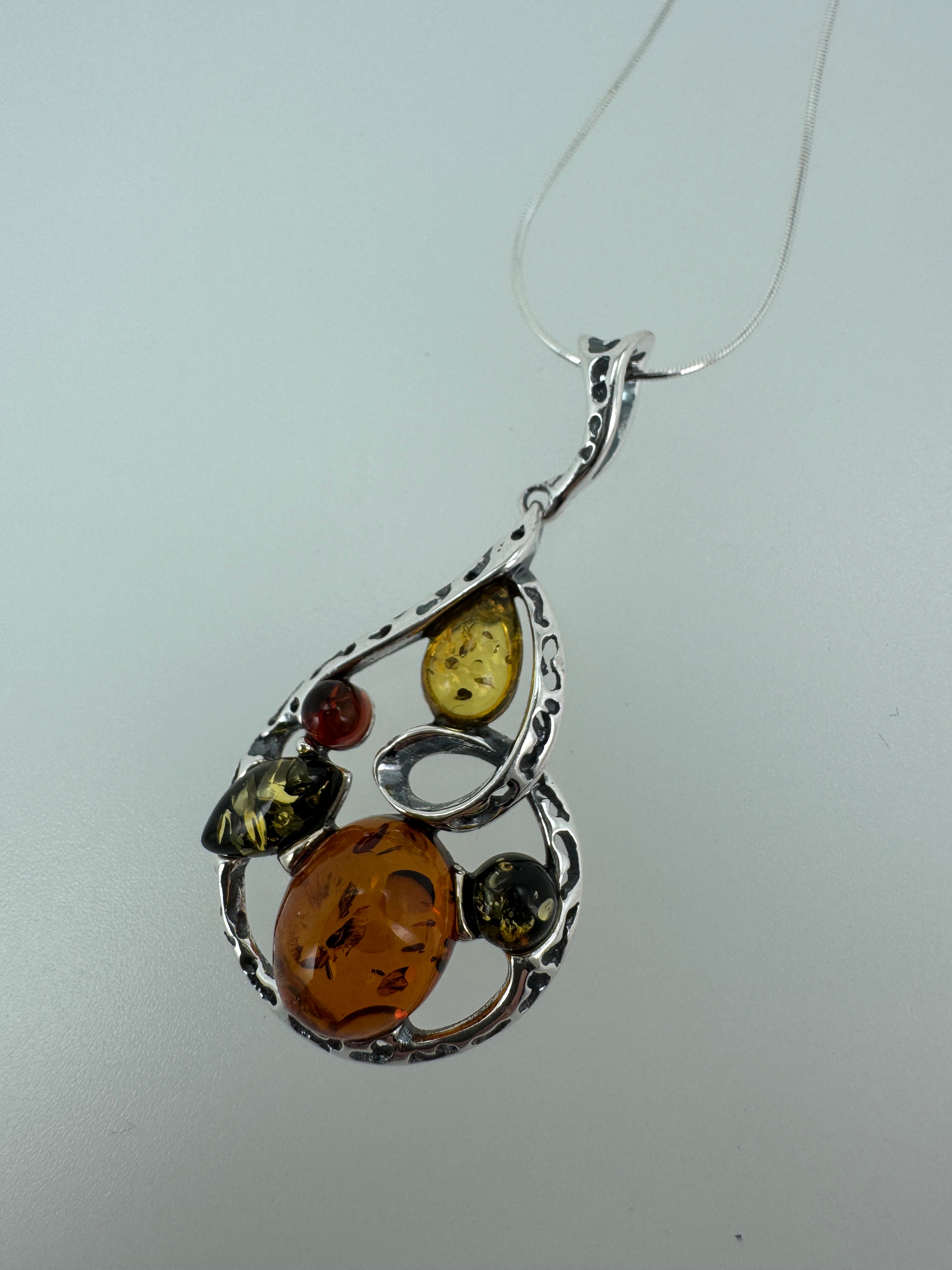 Artisan Multicolor Baltic Amber Pendant in Oxidized Sterling Silver