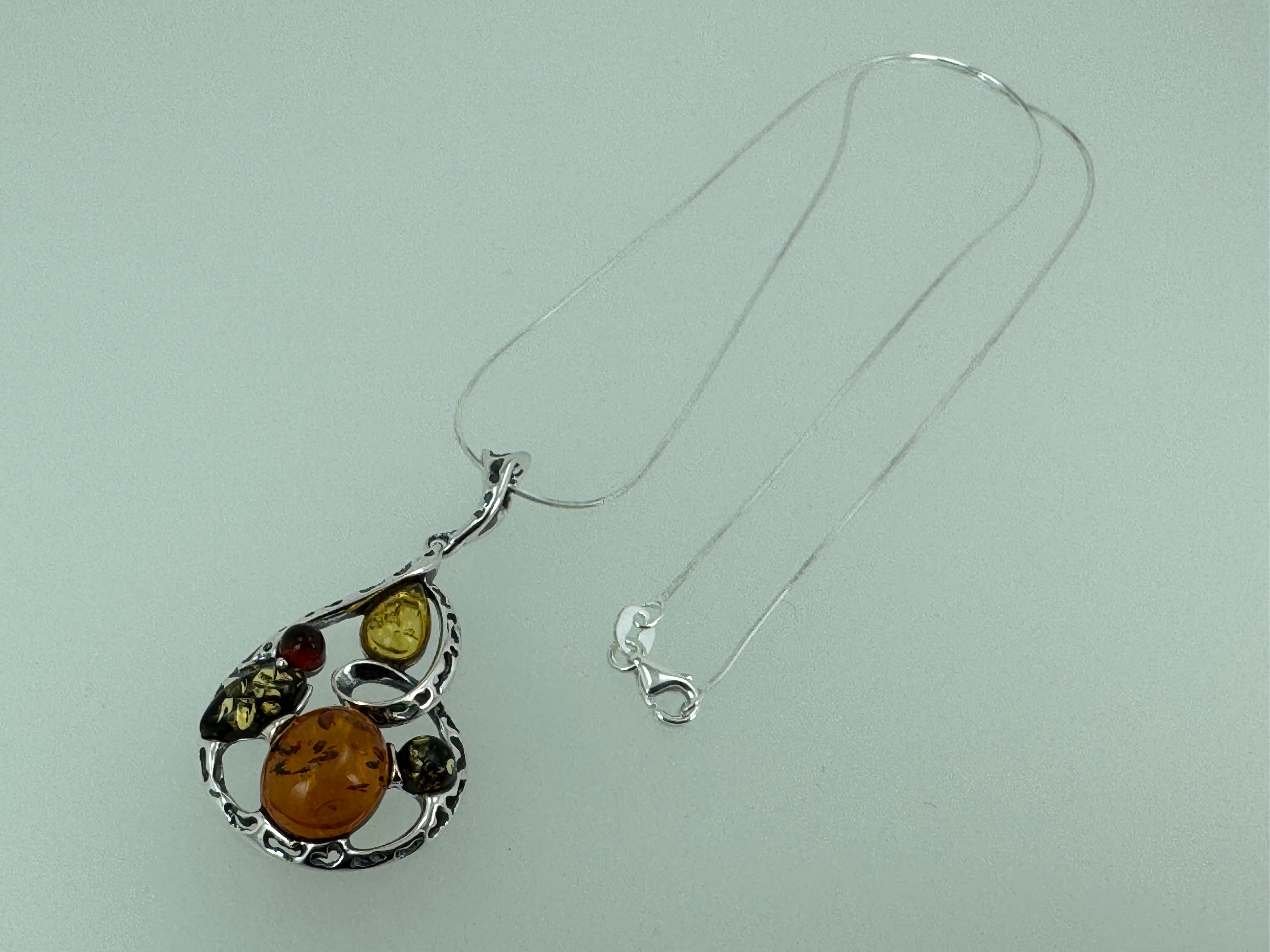 Artisan Multicolor Baltic Amber Pendant in Oxidized Sterling Silver