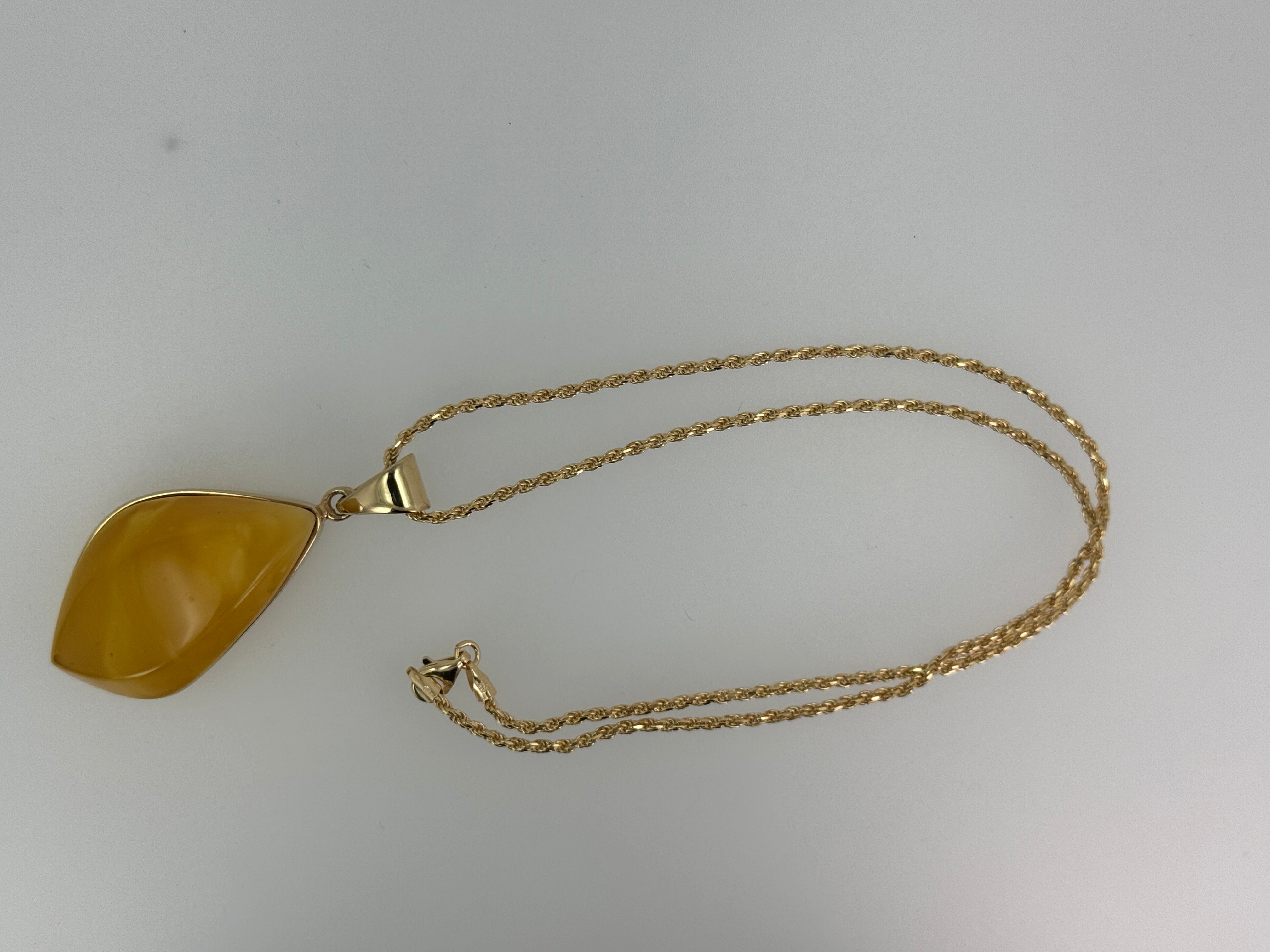 Golden Glow of the Earth | One-of-a-Kind Butterscotch Amber Pendant set in Gold Platted Sterling Silver