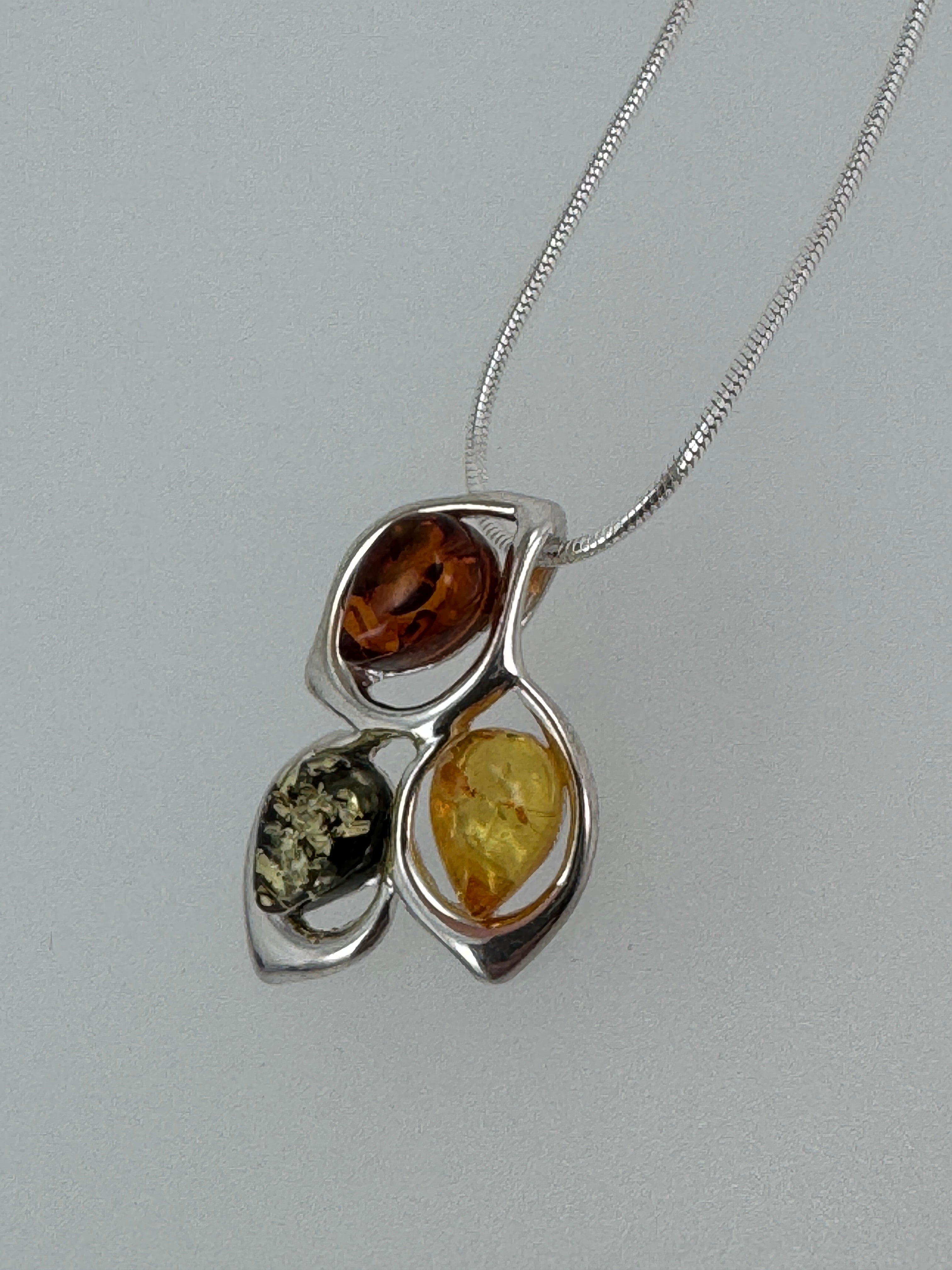 Trio of Light: Multicolor Baltic Amber Pendant on silver box chain