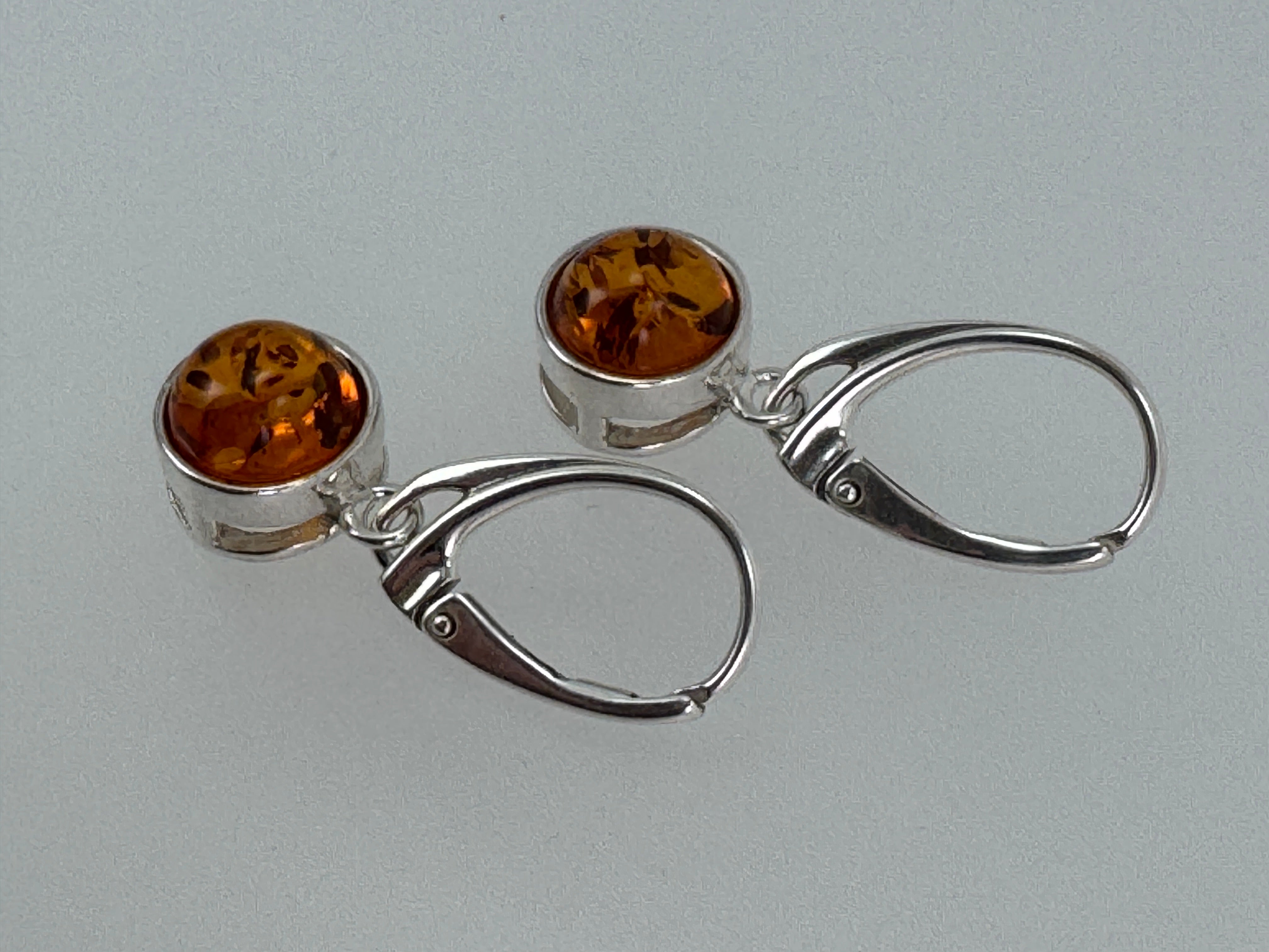 Modern Sterling Silver Dangle Earrings with Round Honey Baltic Amber – Lever Back Design