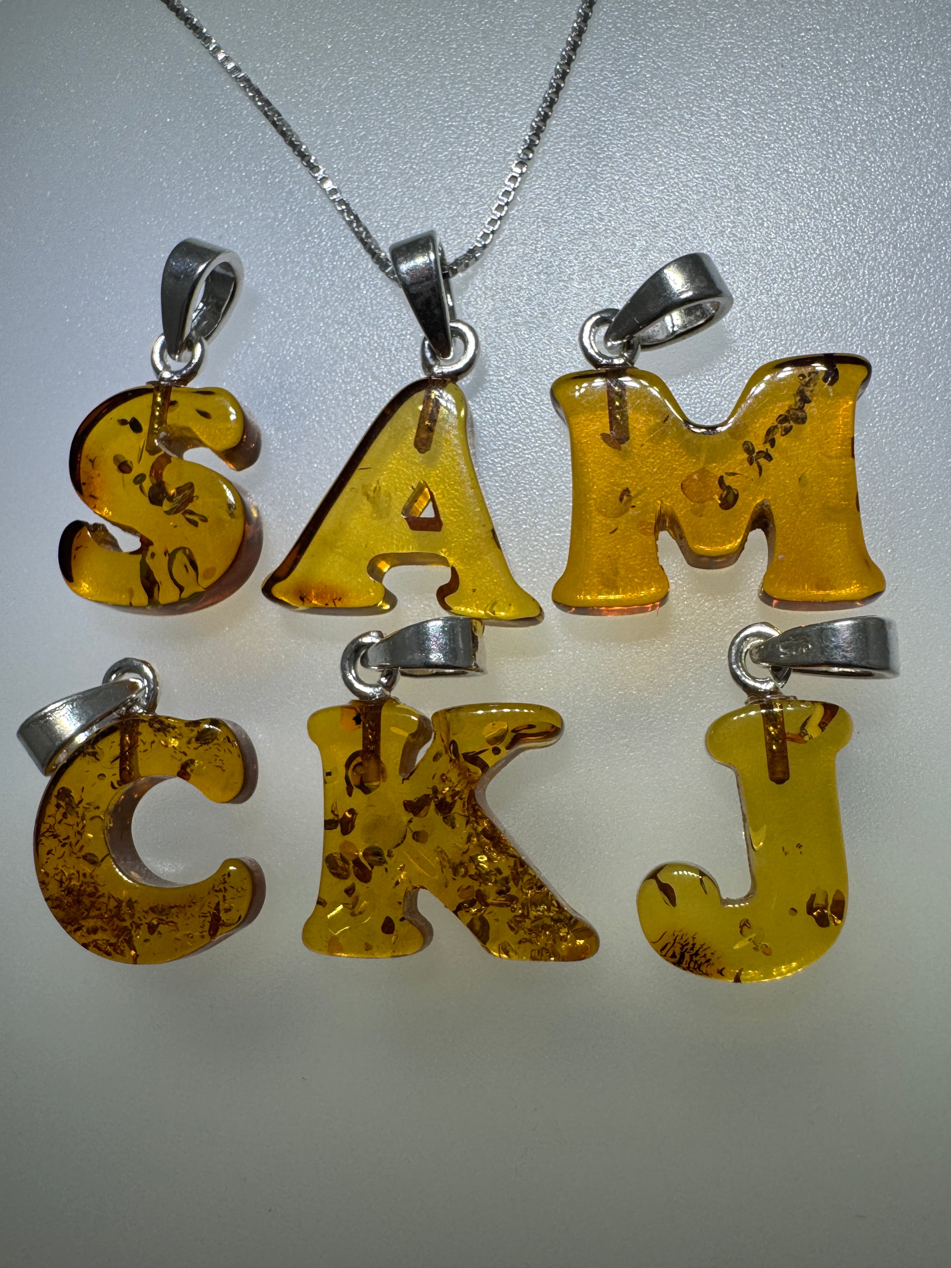 Personalized Baltic Amber Initial Pendant – Handcarved from one stone - shipped on choice of silver chain.