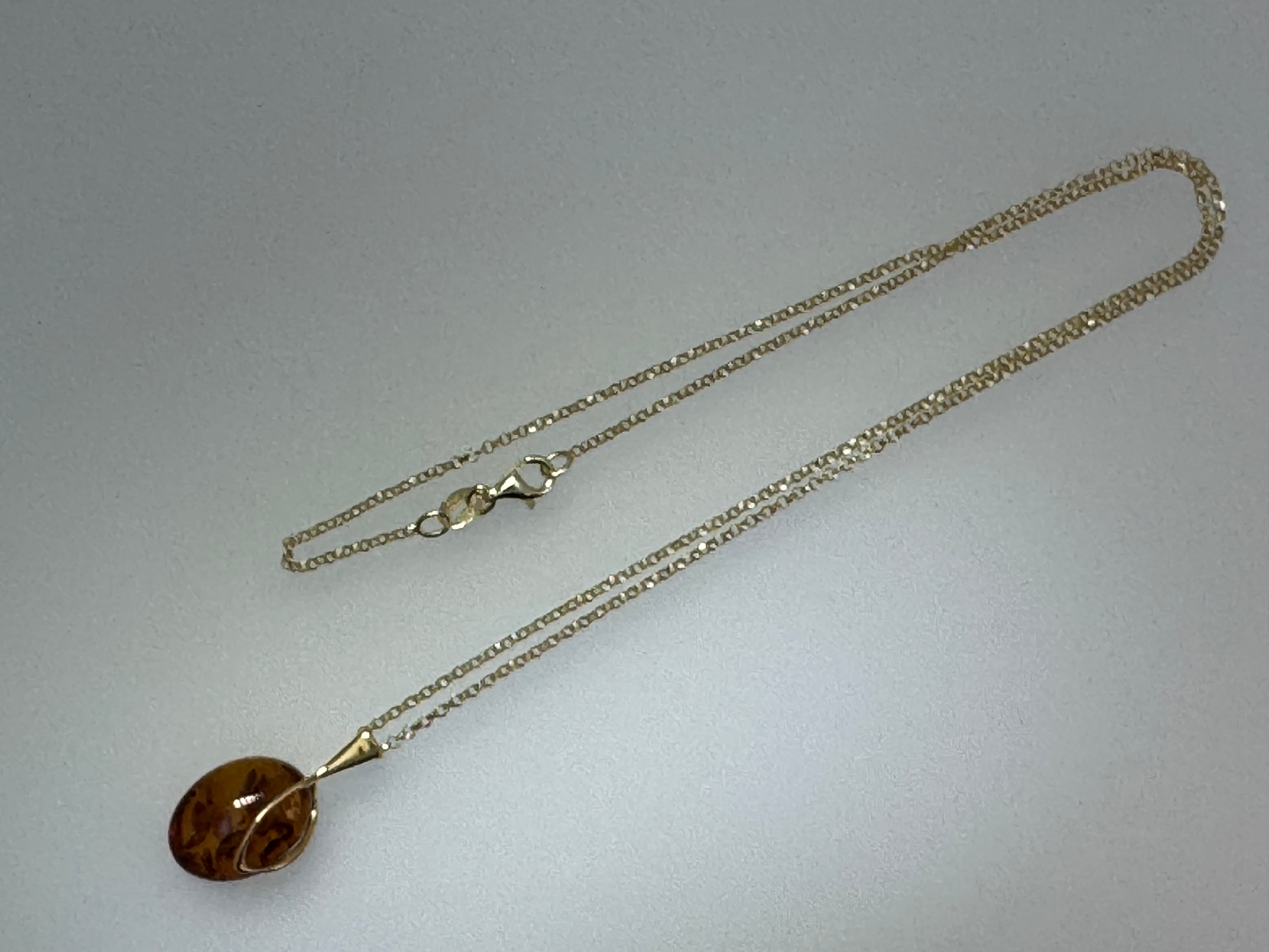 Golden Glow: Honey Cognac Amber Oval Pendant shipped on Gold Platted Silver Chain