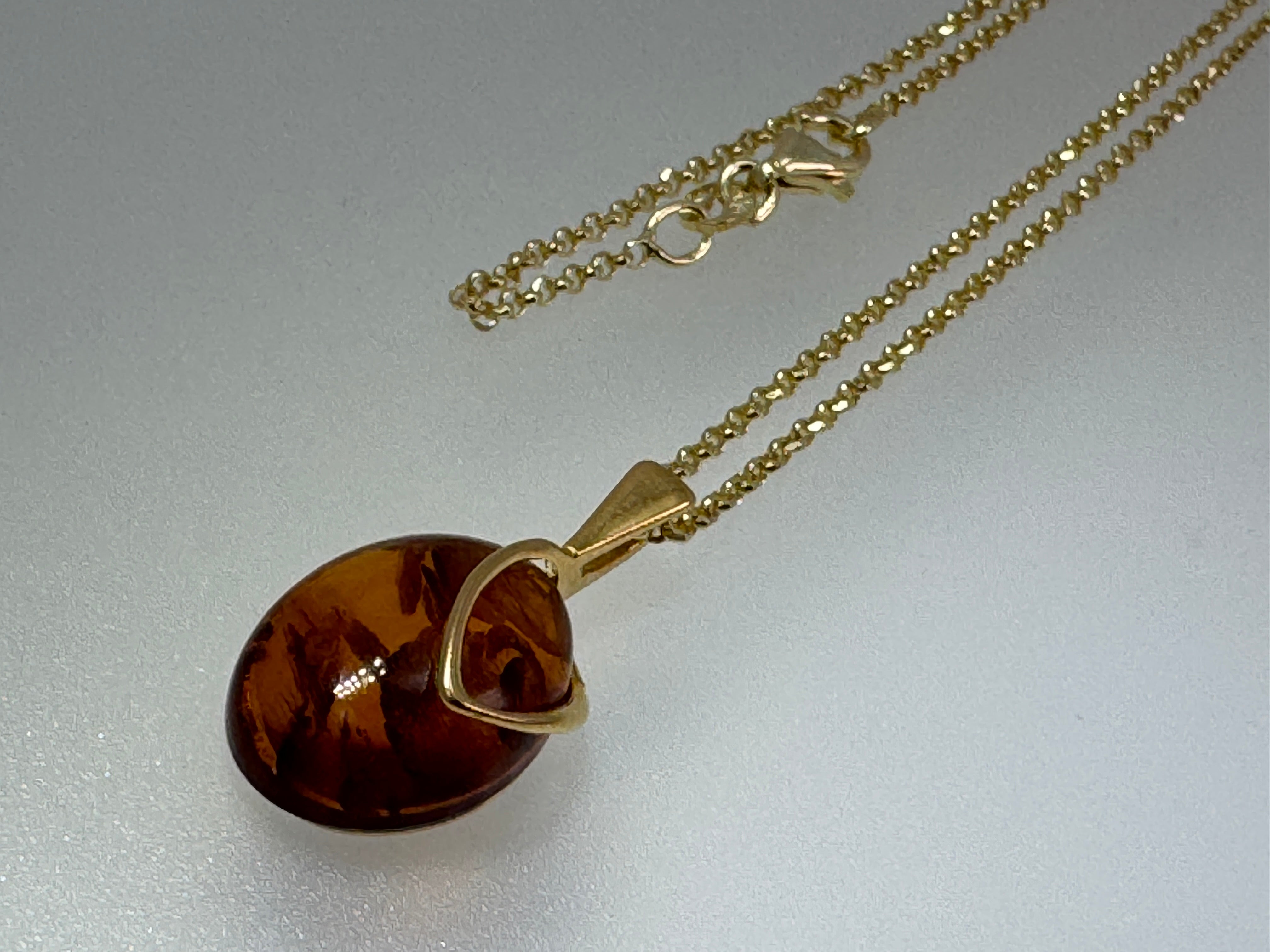 Golden Glow: Honey Cognac Amber Oval Pendant shipped on Gold Platted Silver Chain