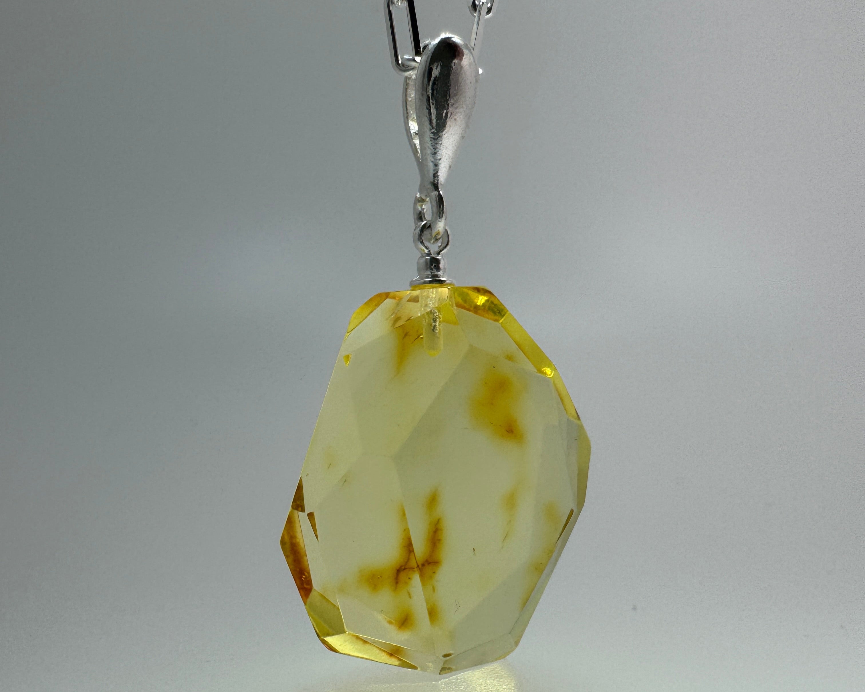 Radiant lemon glow – Faceted lemon Baltic amber pendant on choice of silver chain
