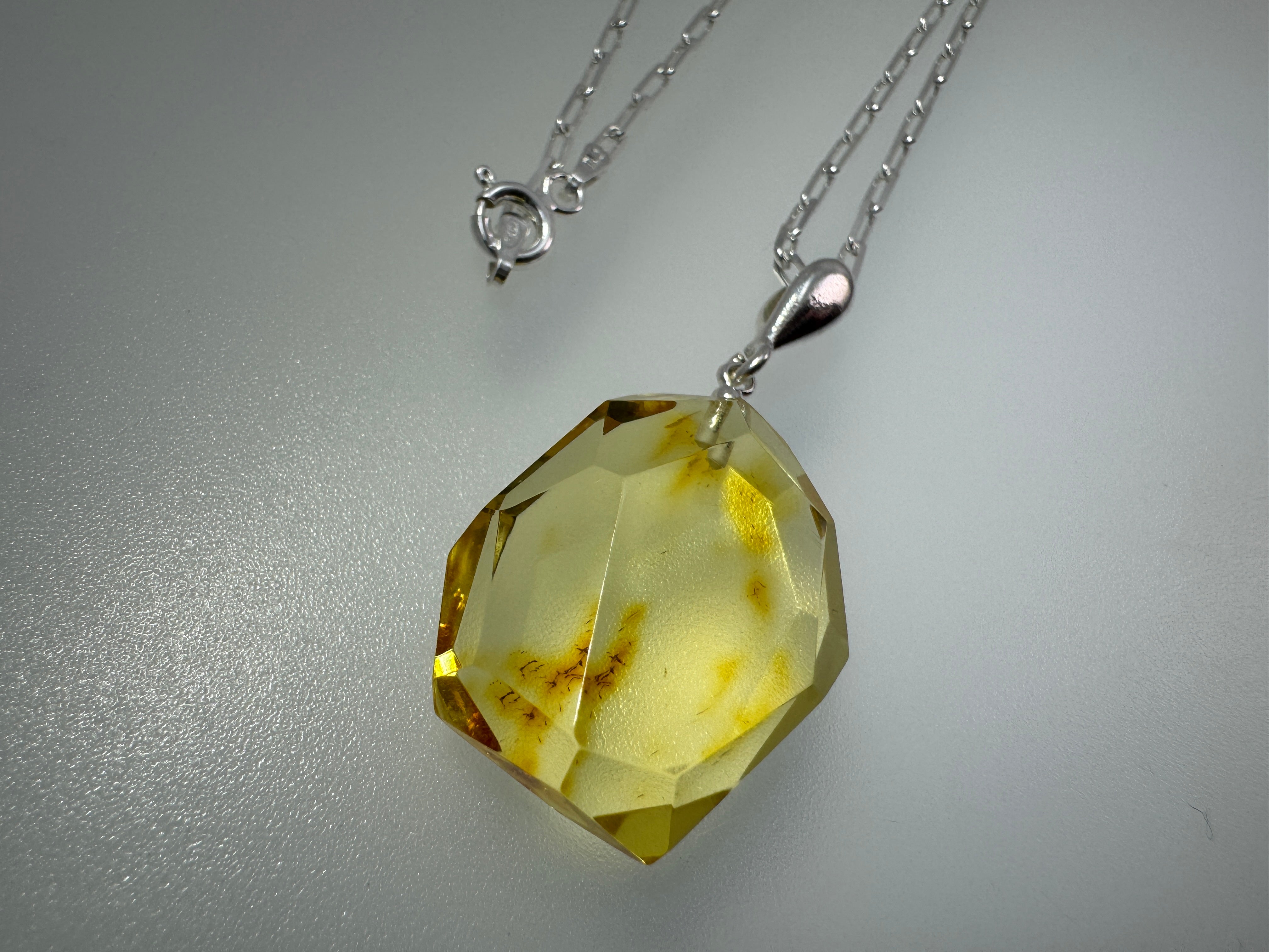 Radiant lemon glow – Faceted lemon Baltic amber pendant on choice of silver chain
