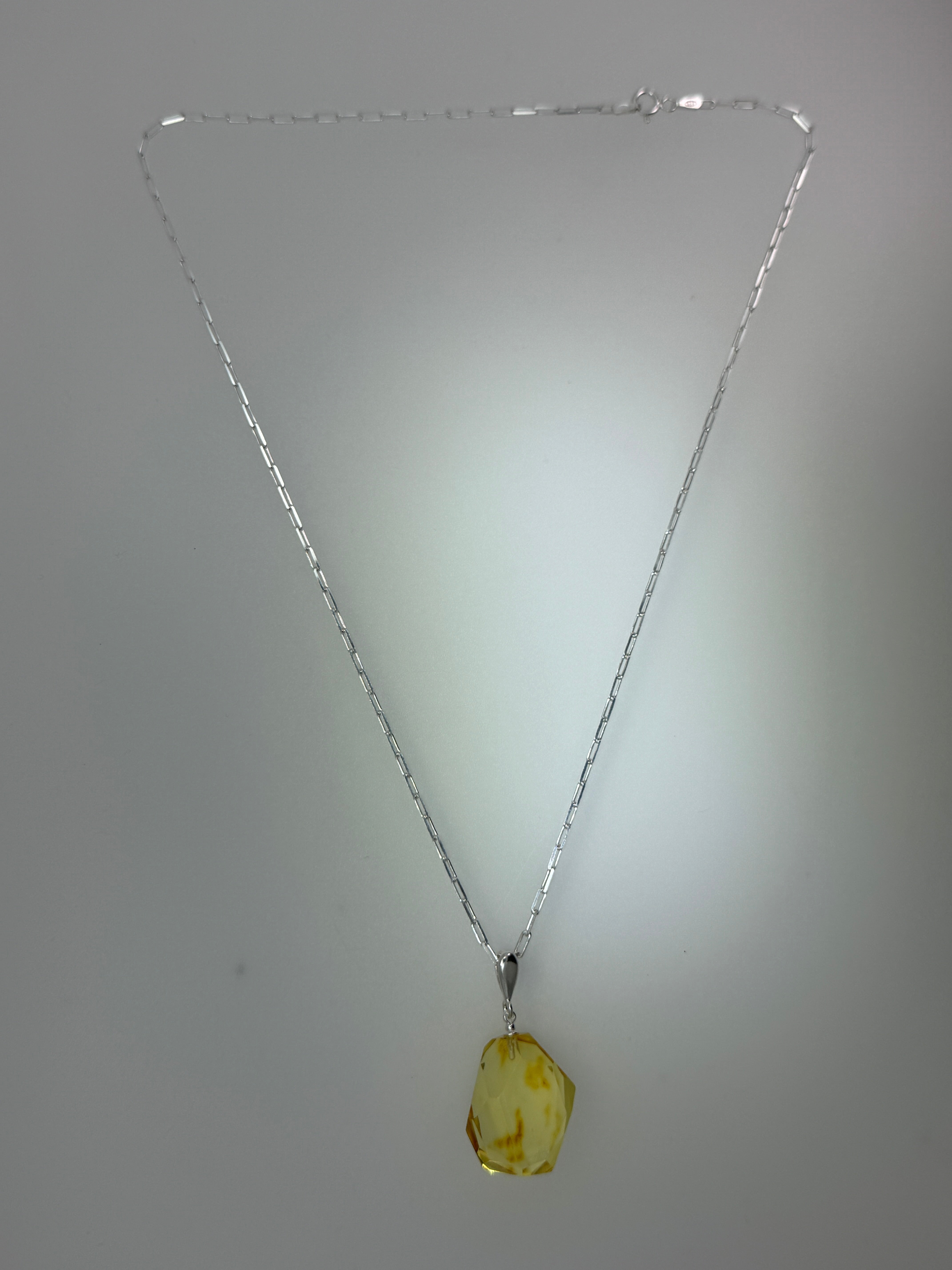 Radiant lemon glow – Faceted lemon Baltic amber pendant on choice of silver chain