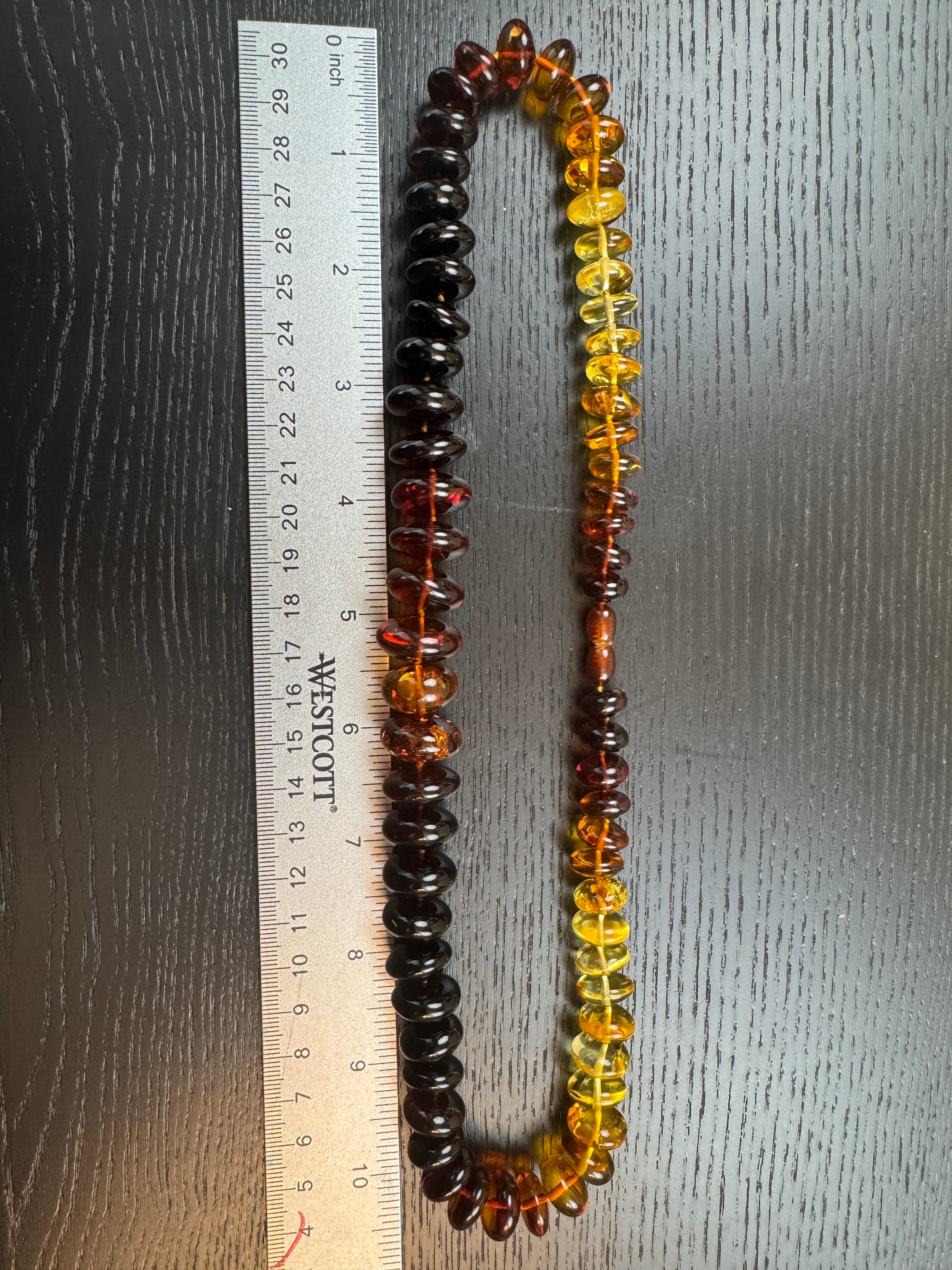 Museum Quality Rainbow Multicolor Ombré Baltic Amber Donut Bead Necklace – 22 Inch Graduated Strand