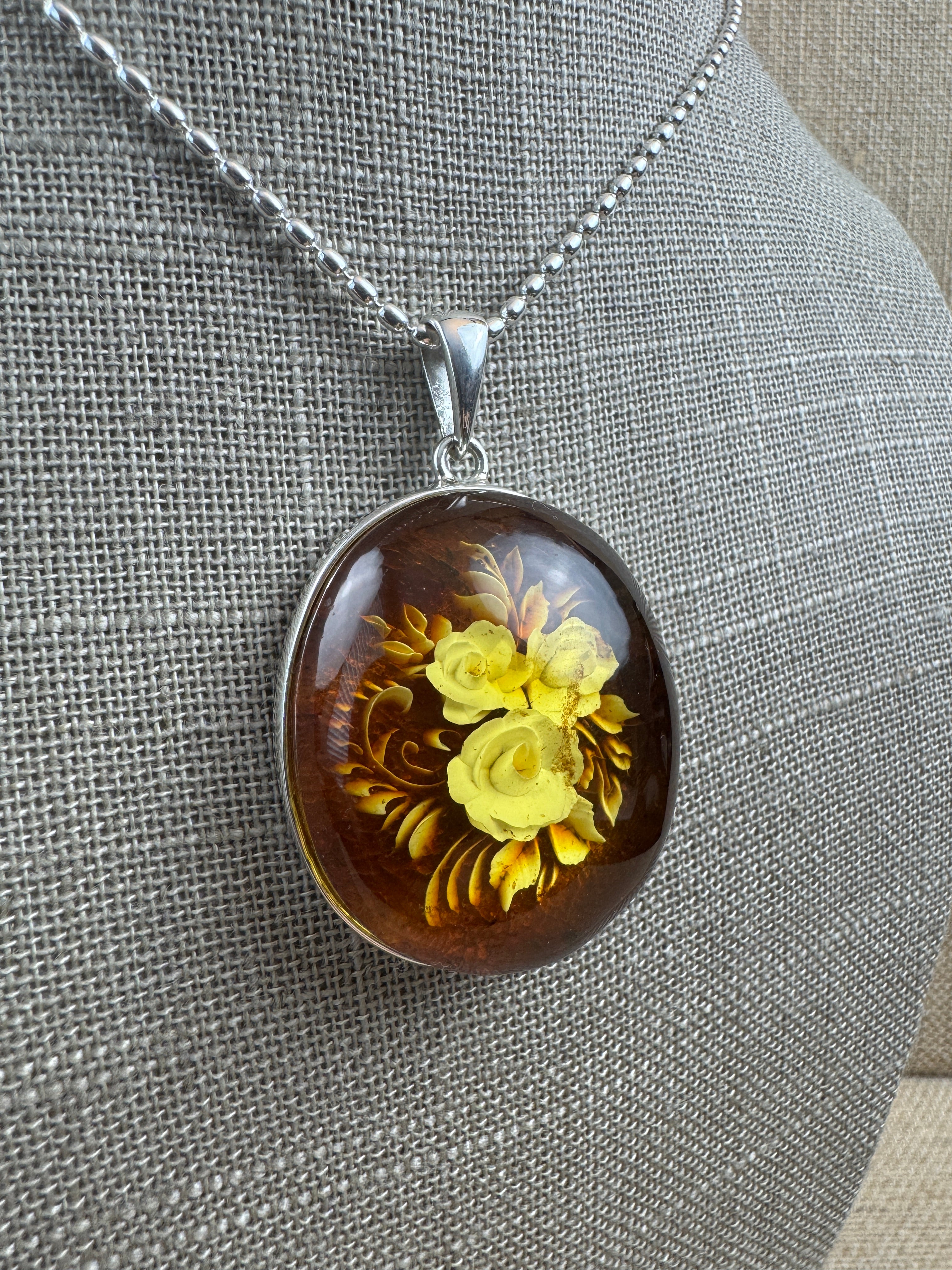Timeless Elegance: Hand-Carved Baltic Amber Intaglio Flower Pendant