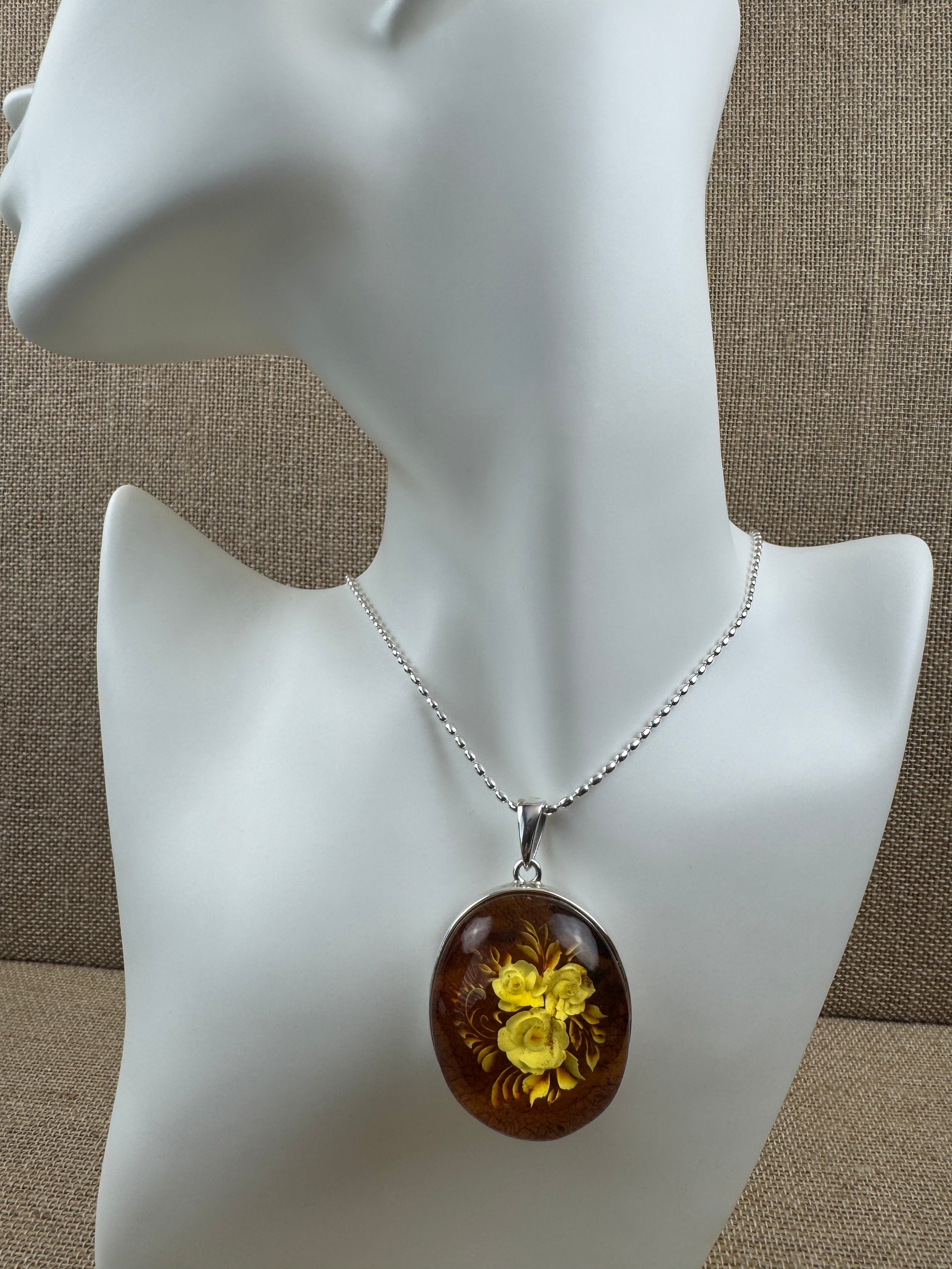 Timeless Elegance: Hand-Carved Baltic Amber Intaglio Flower Pendant