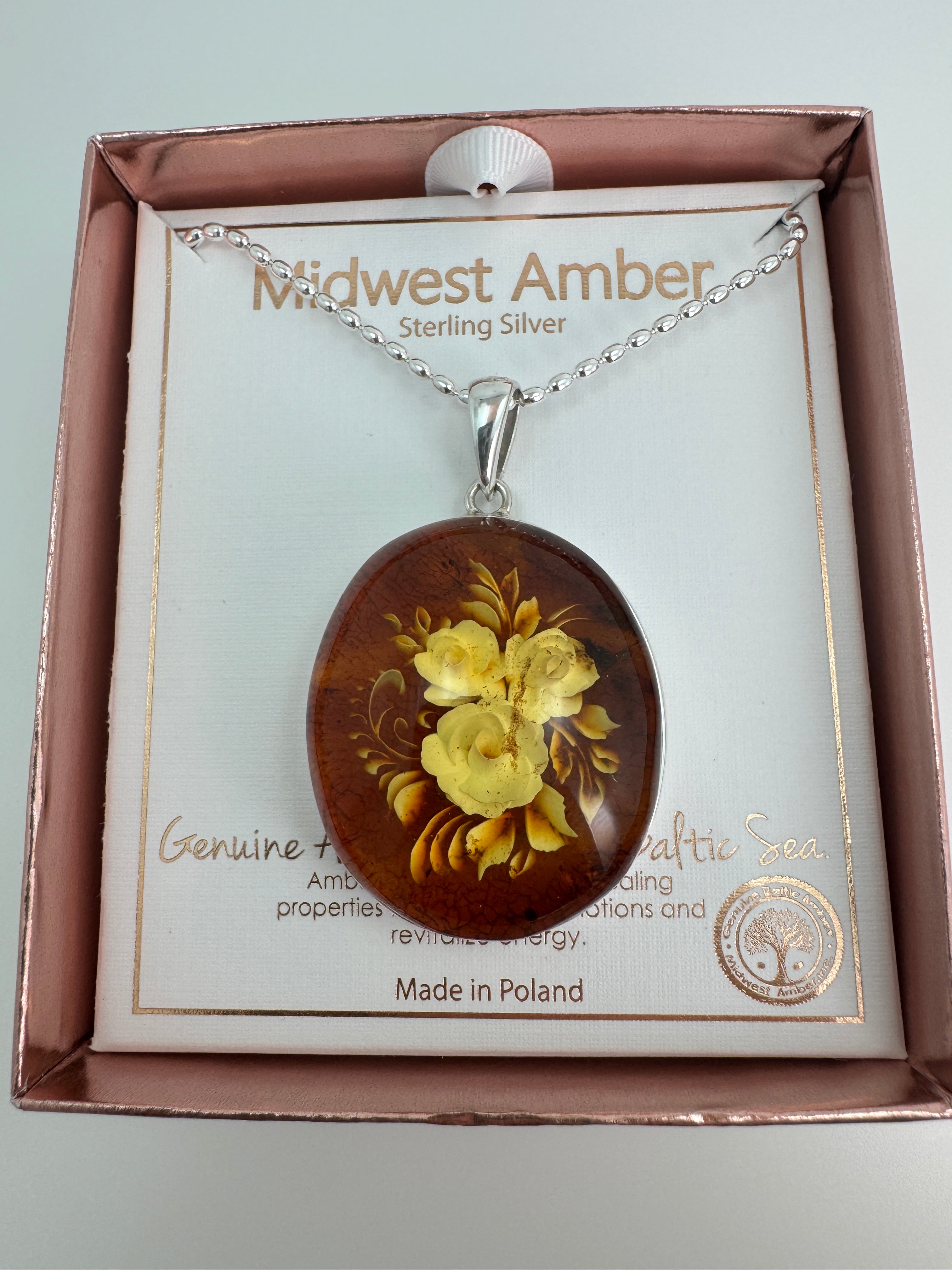Timeless Elegance: Hand-Carved Baltic Amber Intaglio Flower Pendant