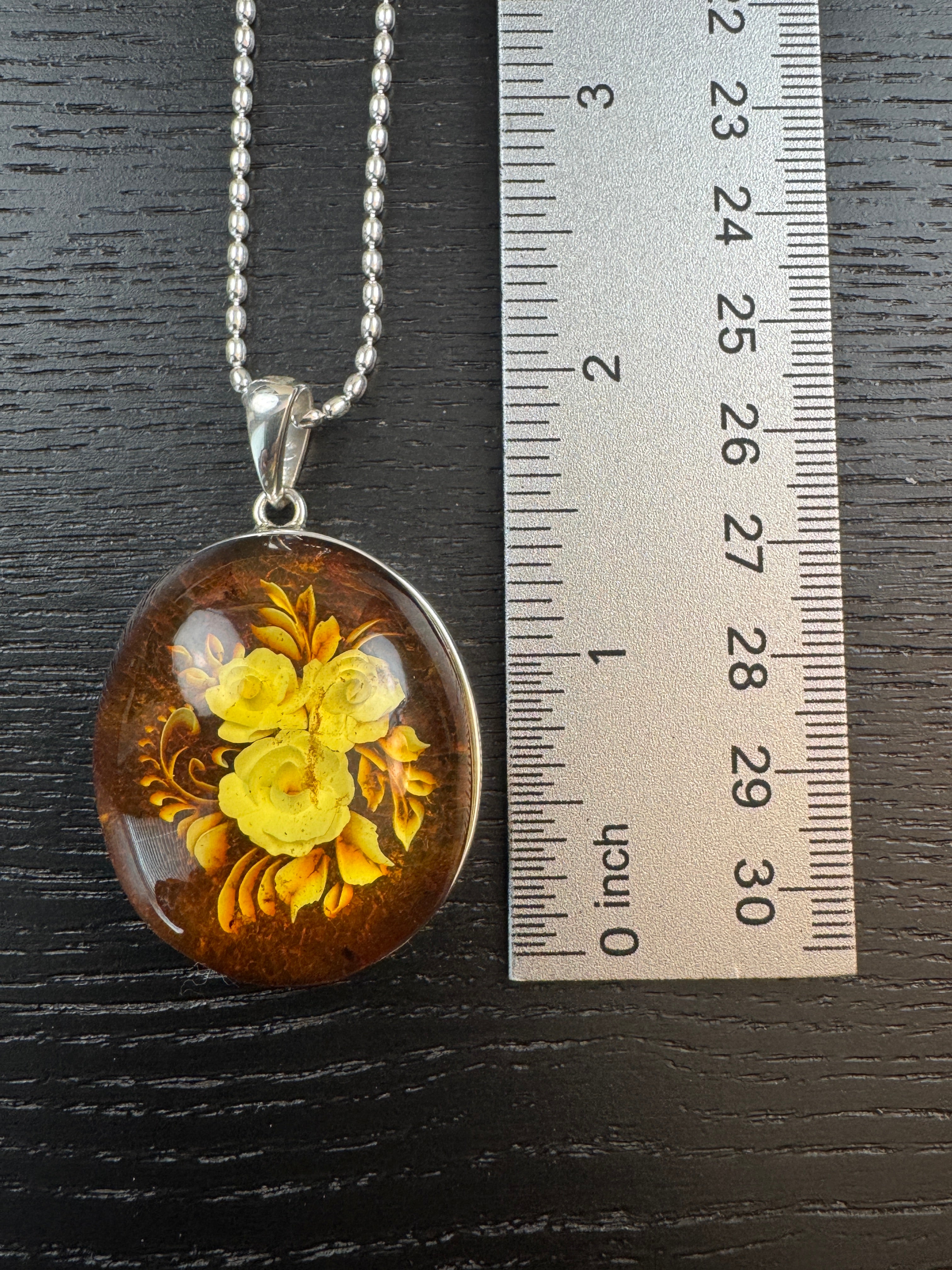 Timeless Elegance: Hand-Carved Baltic Amber Intaglio Flower Pendant