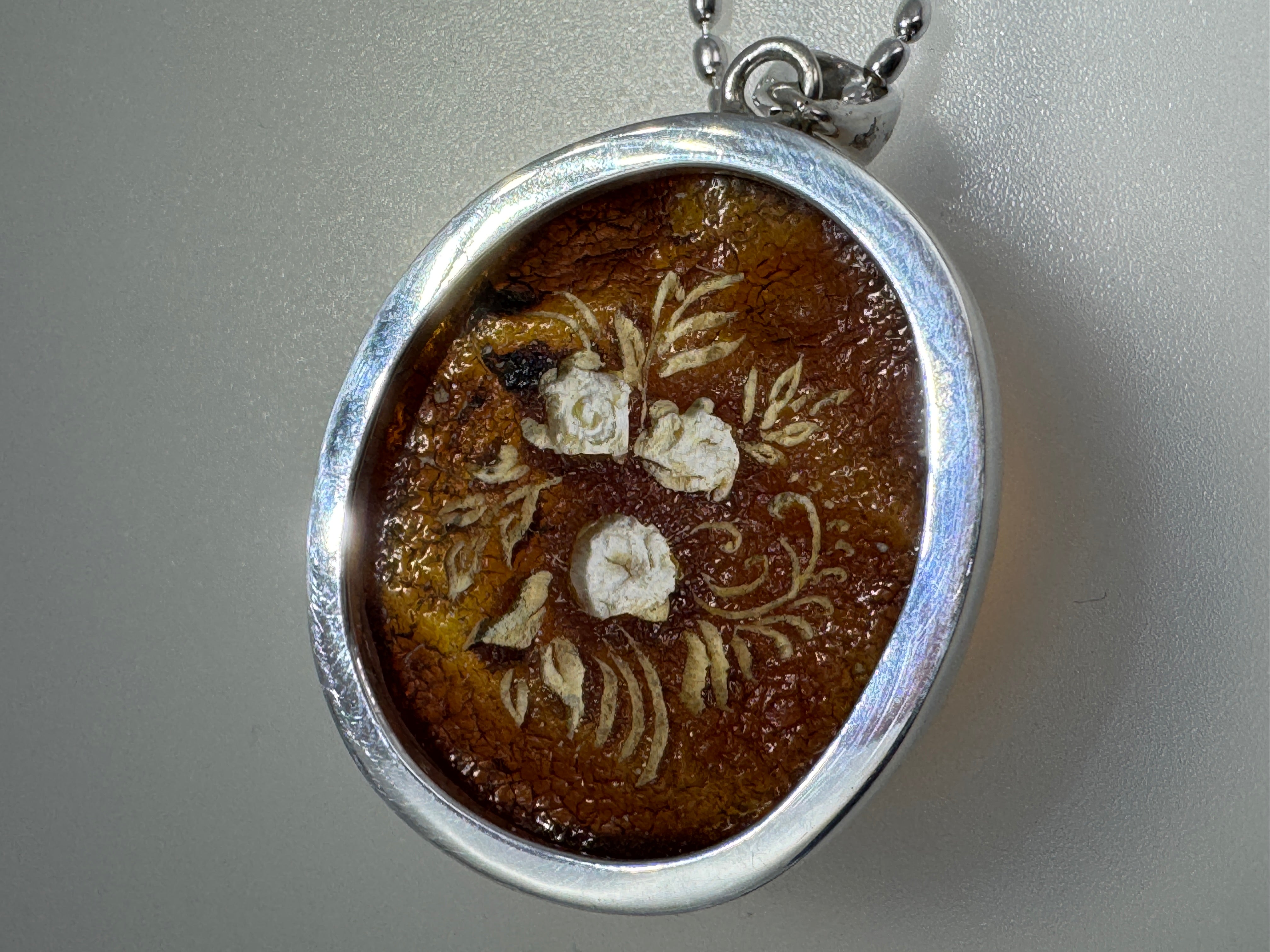 Timeless Elegance: Hand-Carved Baltic Amber Intaglio Flower Pendant