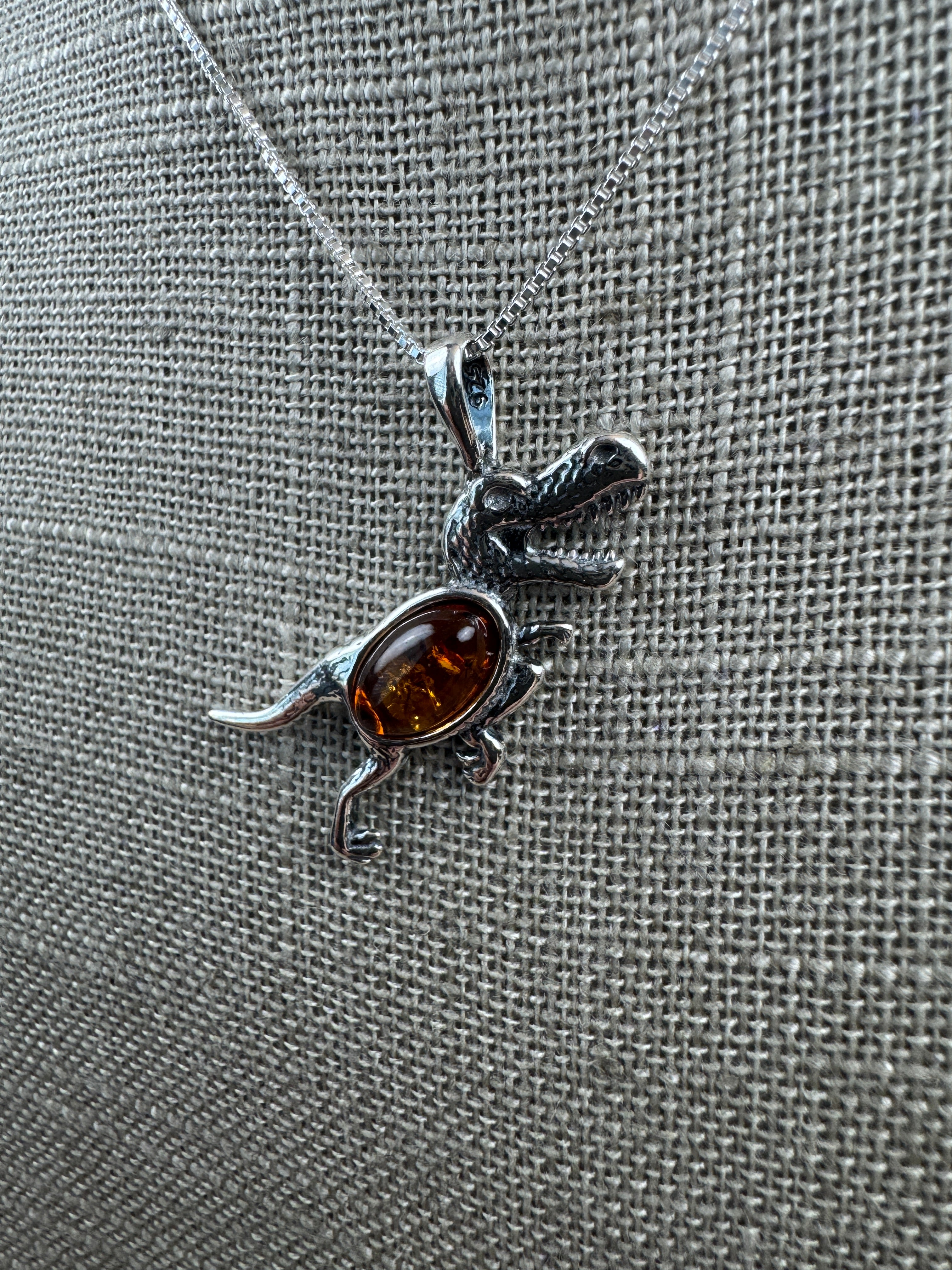 Tiny T-Rex Terror! Baltic Amber Dino Pendant - Shipped on Silver chain or leather