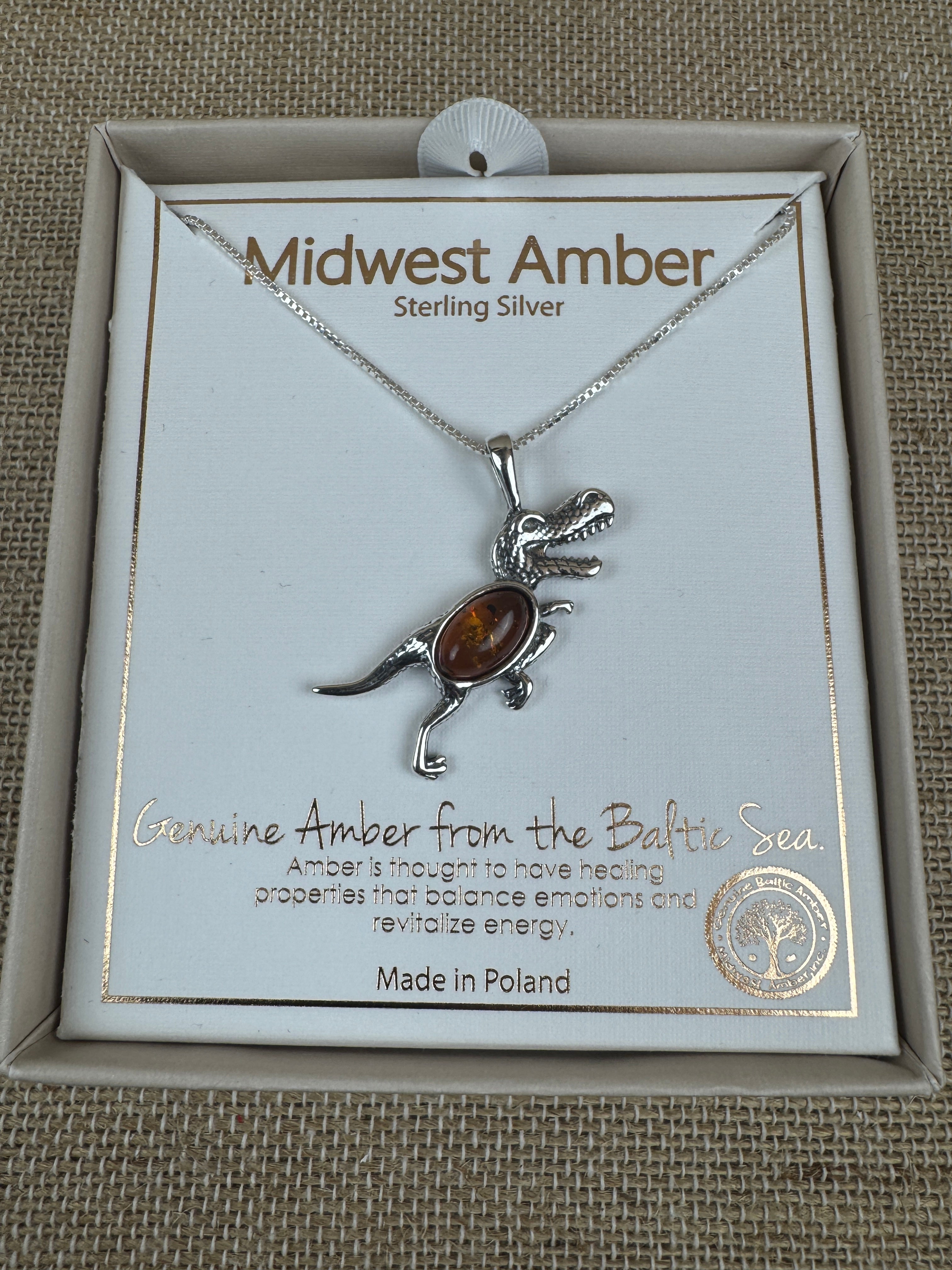 Tiny T-Rex Terror! Baltic Amber Dino Pendant - Shipped on Silver chain or leather