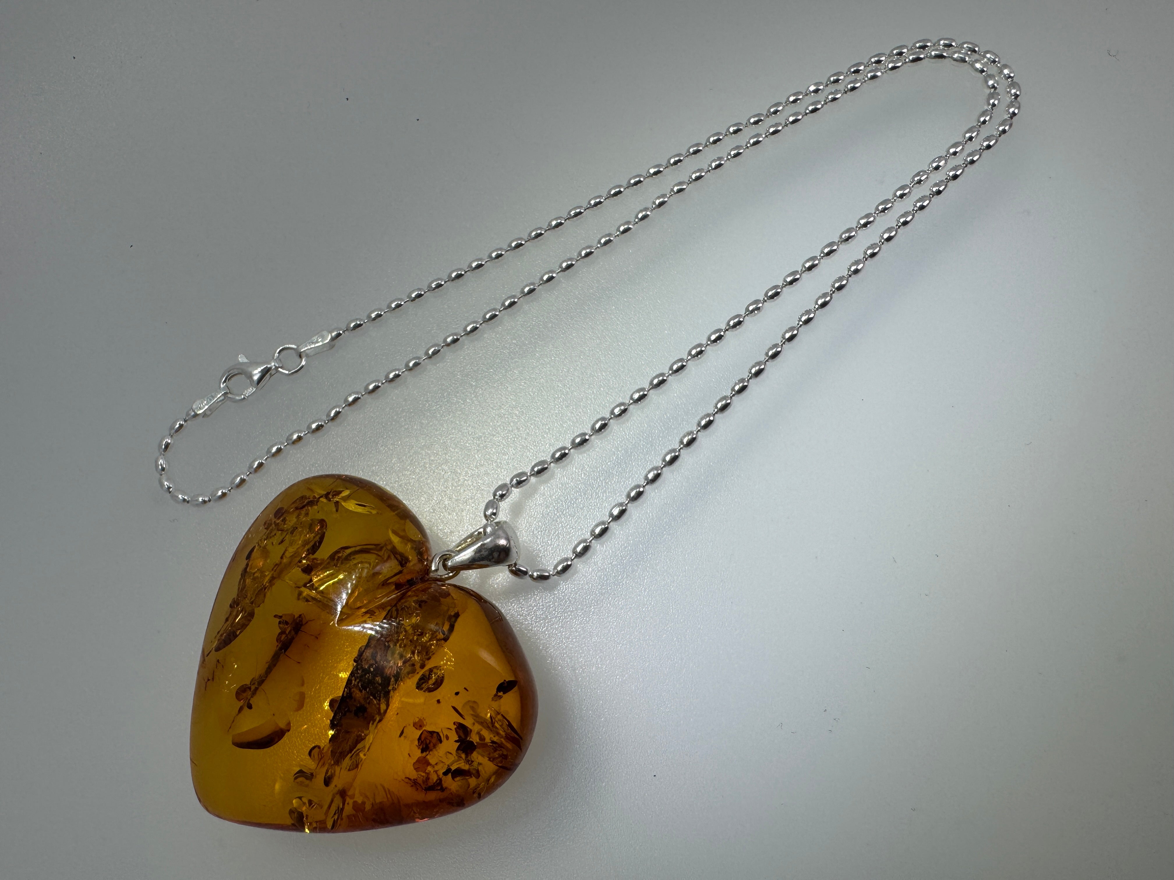 Oversized Hand-Carved Baltic Amber Puffy Heart Pendant – Cognac Honey with Sterling Silver Bead Chain