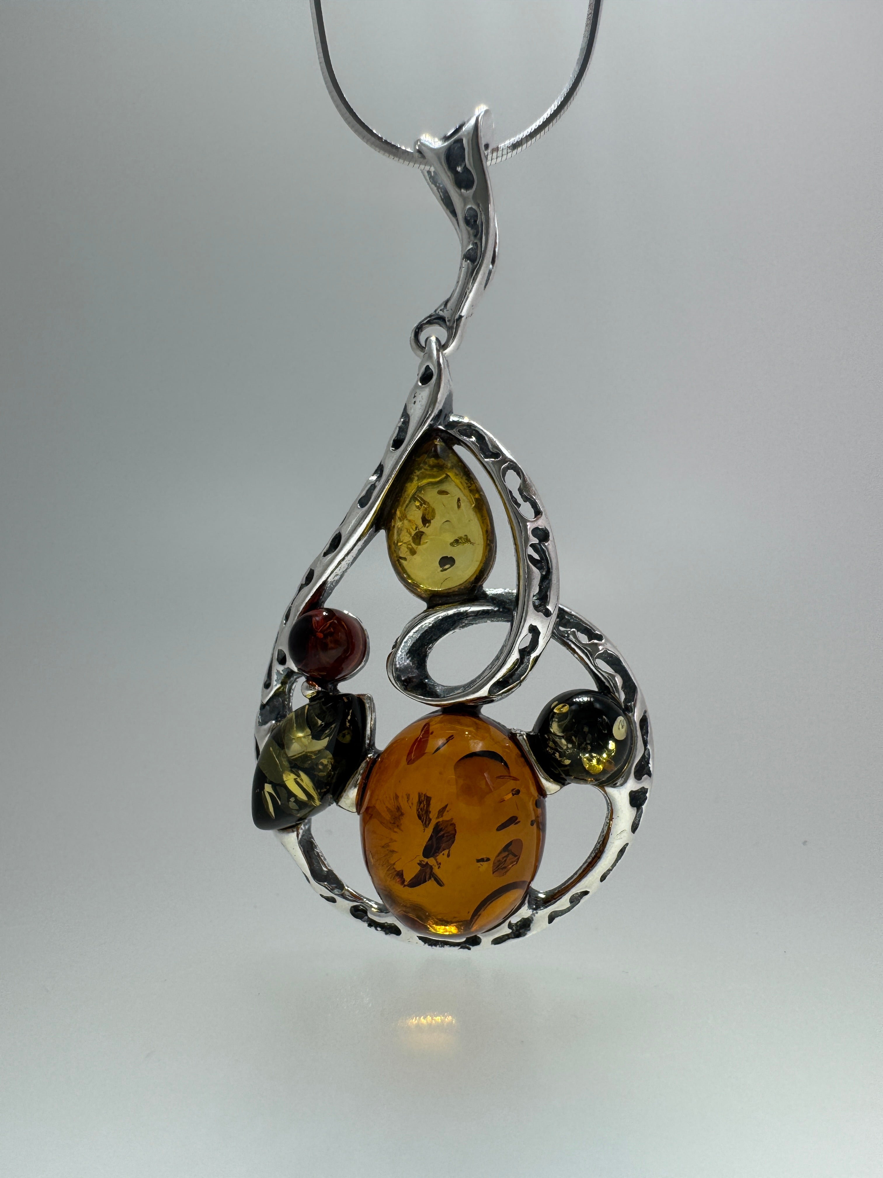 Artisan Multicolor Baltic Amber Pendant in Oxidized Sterling Silver