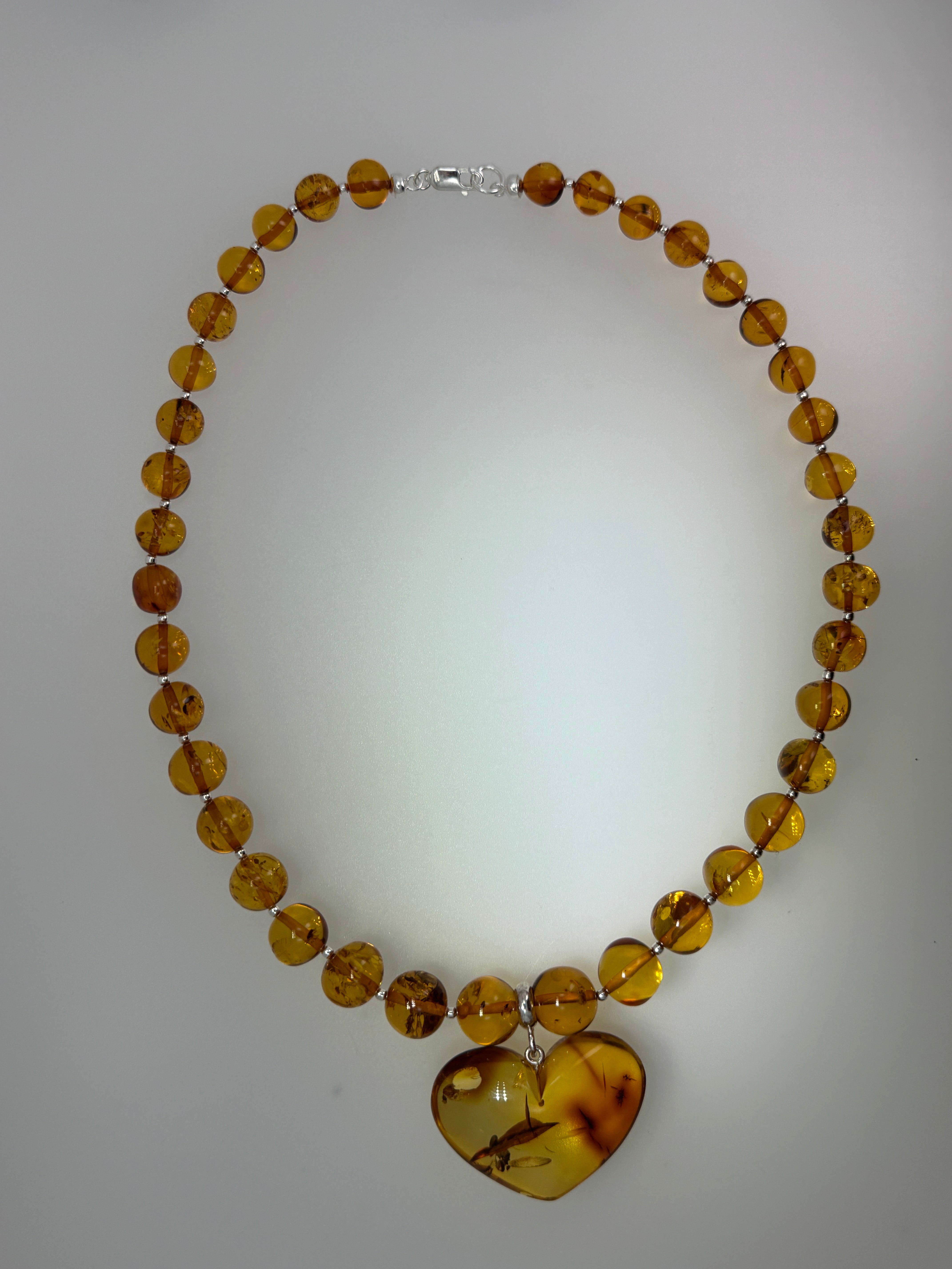 Heart of Amber: One-of-a-Kind Statement Necklace - Amber Beads with oversized Amber Heart Pendant Toggle Necklace