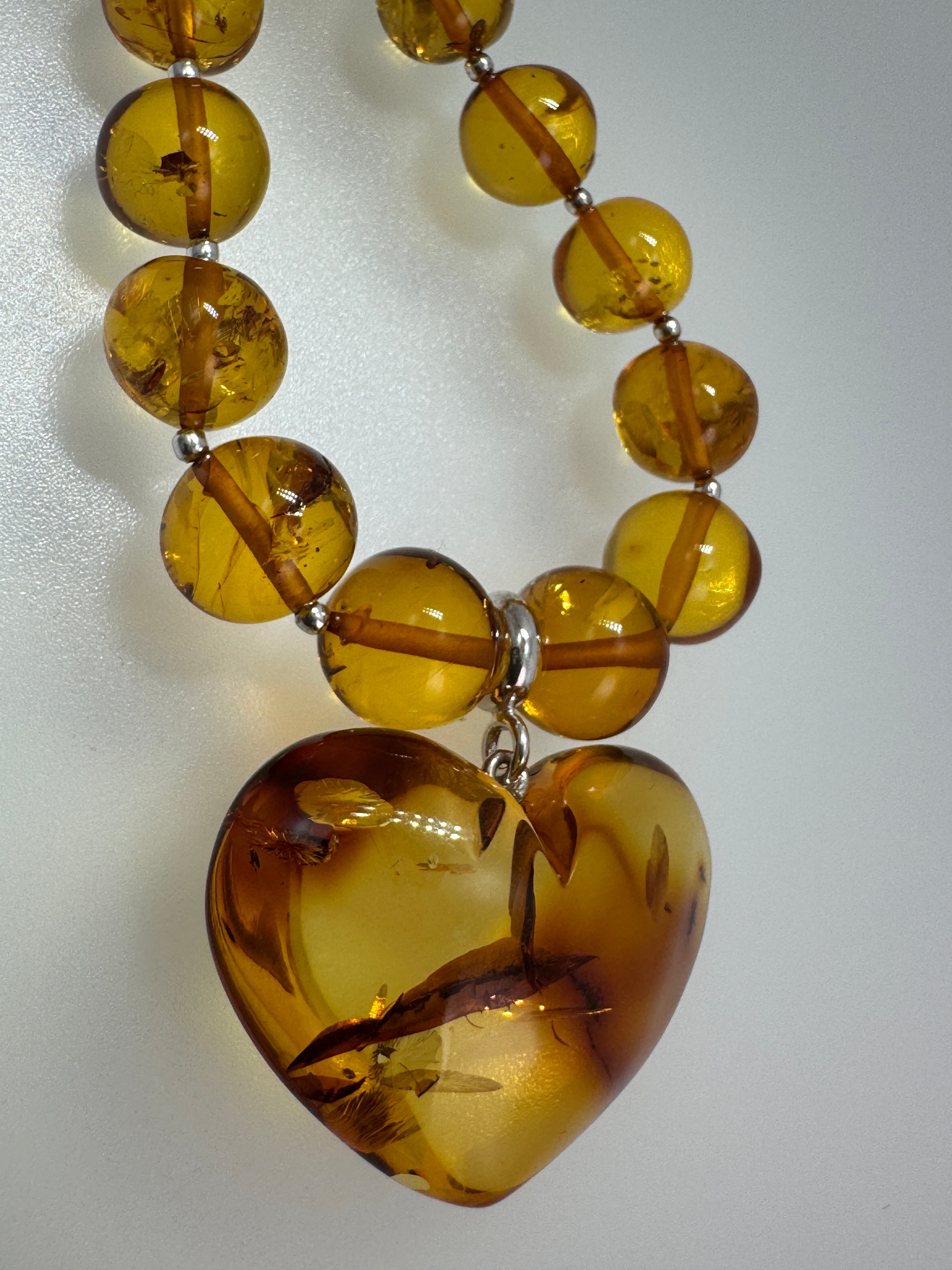 Heart of Amber: One-of-a-Kind Statement Necklace - Amber Beads with oversized Amber Heart Pendant Toggle Necklace