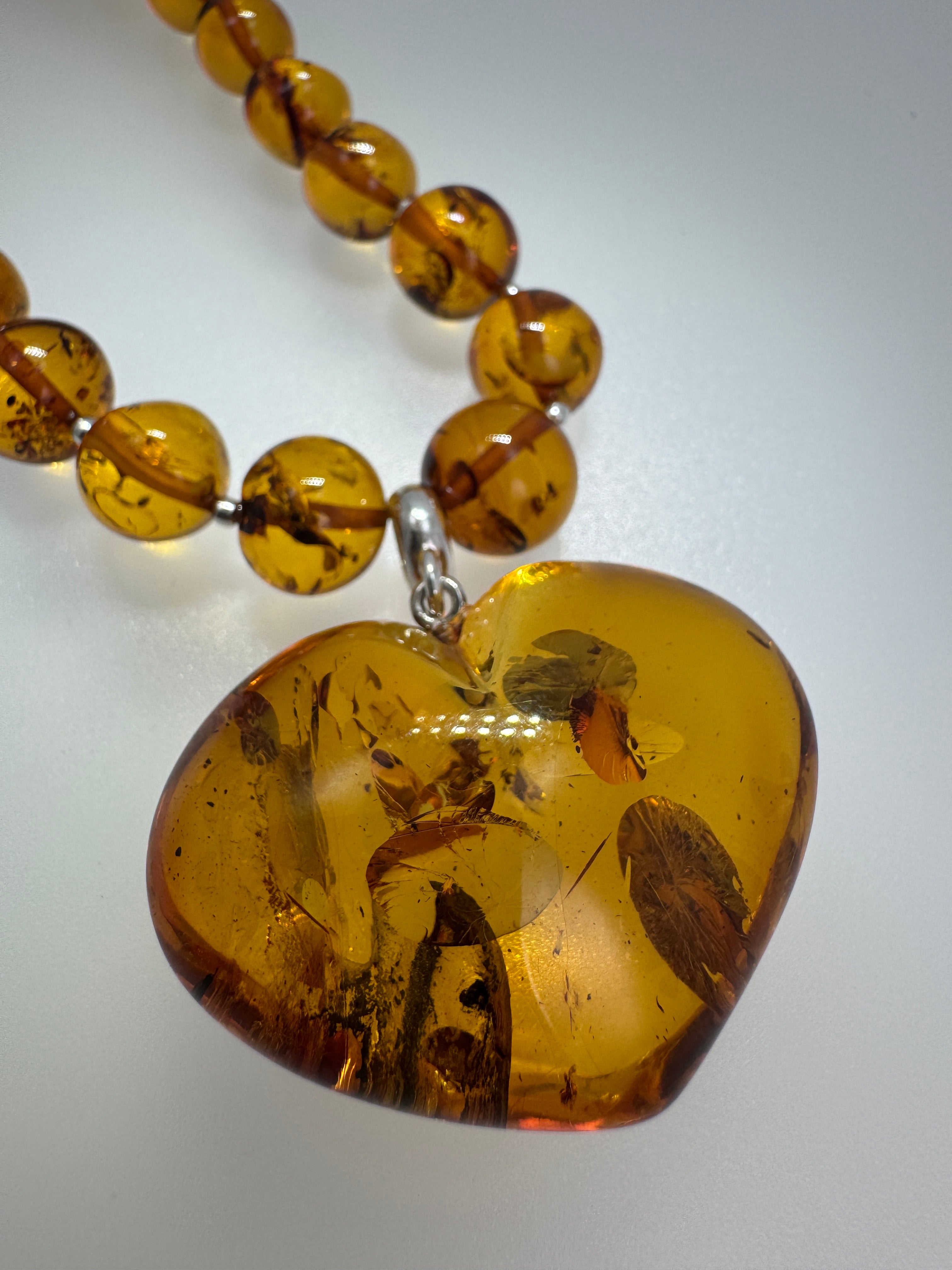 Heart of Amber: One-of-a-Kind Statement Necklace - Amber Beads with oversized Amber Heart Pendant Toggle Necklace