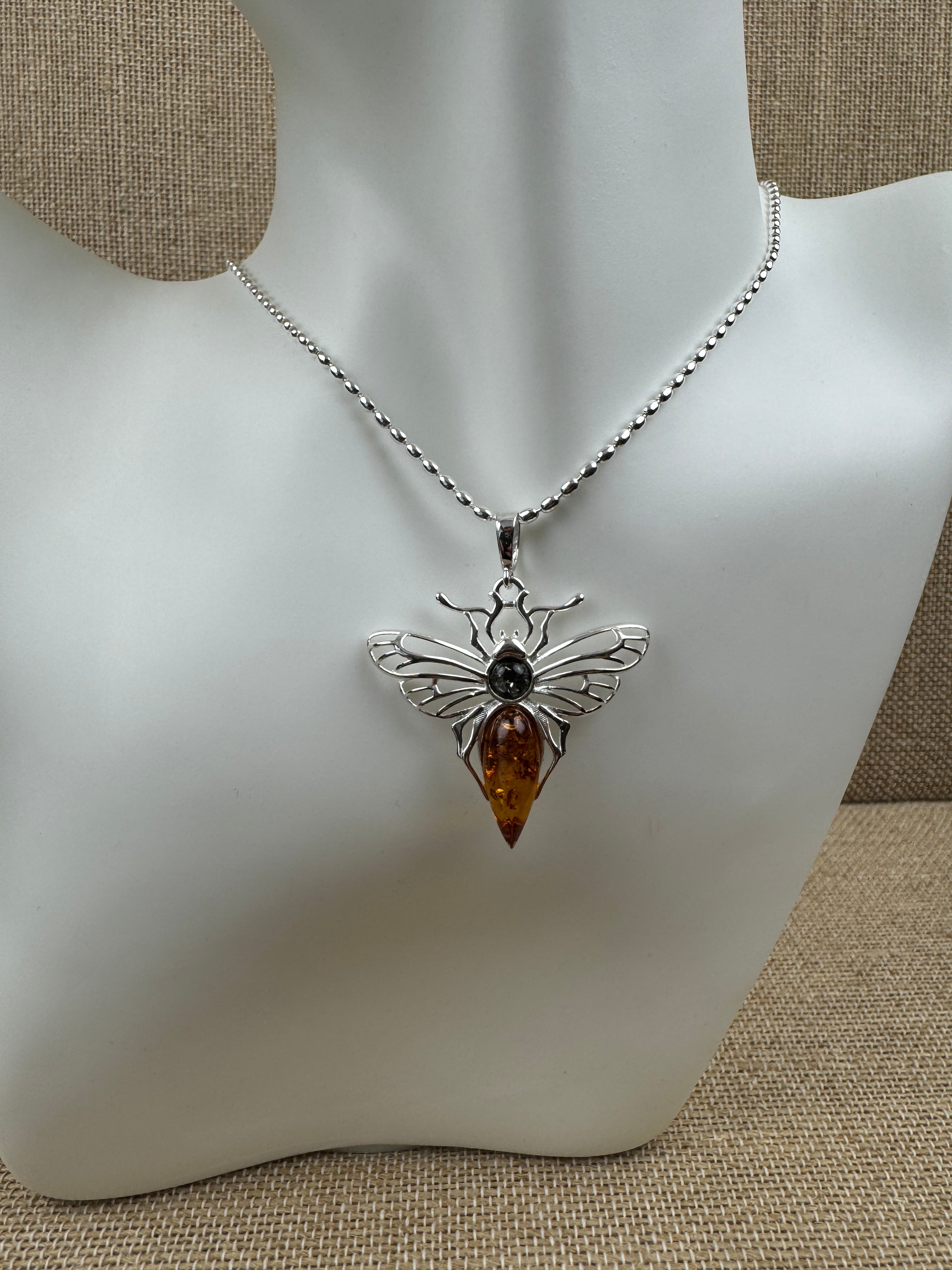 Mystic wings in amber – Sterling silver moth pendant with sterling silver chain