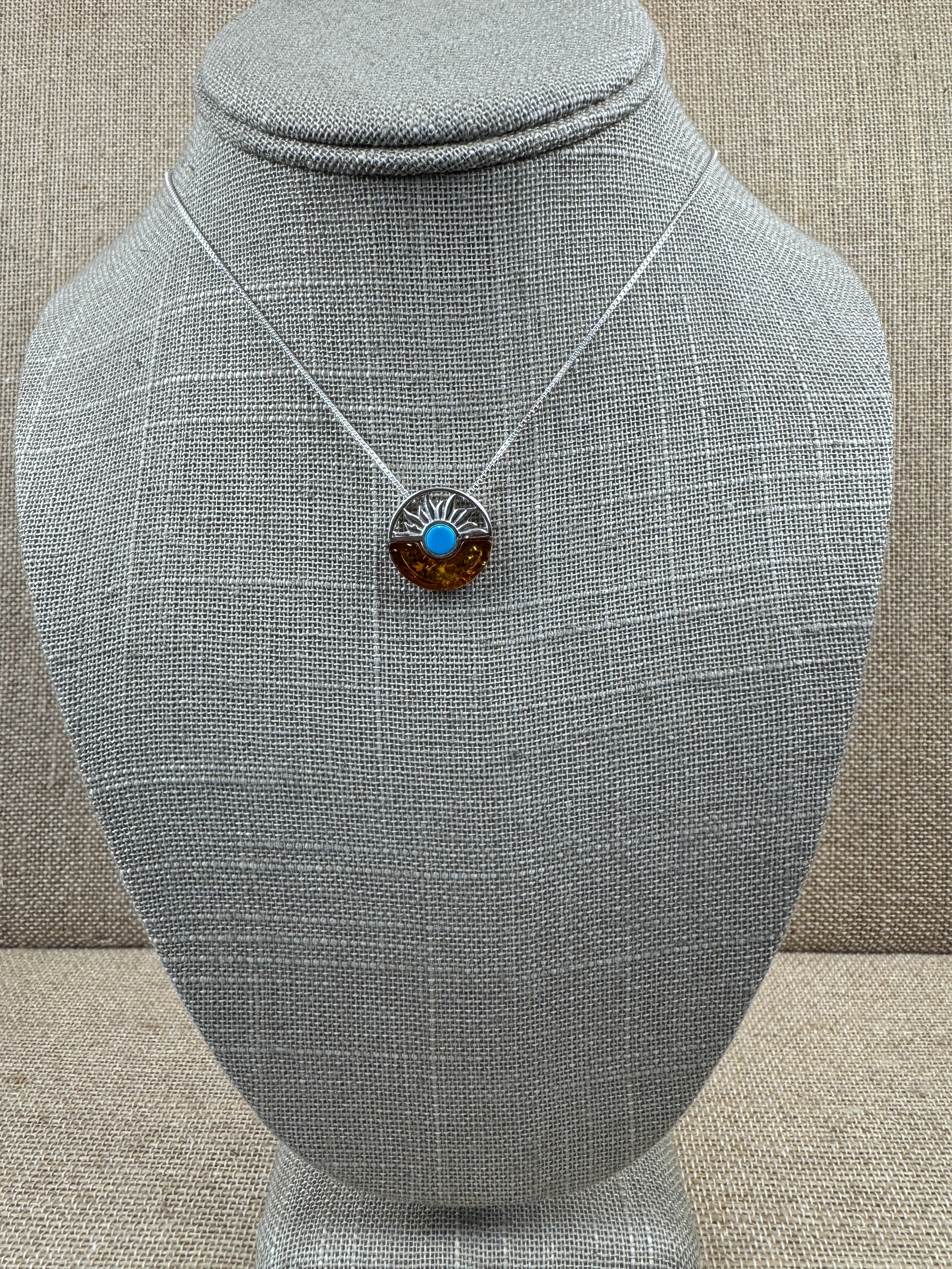 Baltic amber and turquoise pendant on silver chain - A timeless fusion of cultures and nature