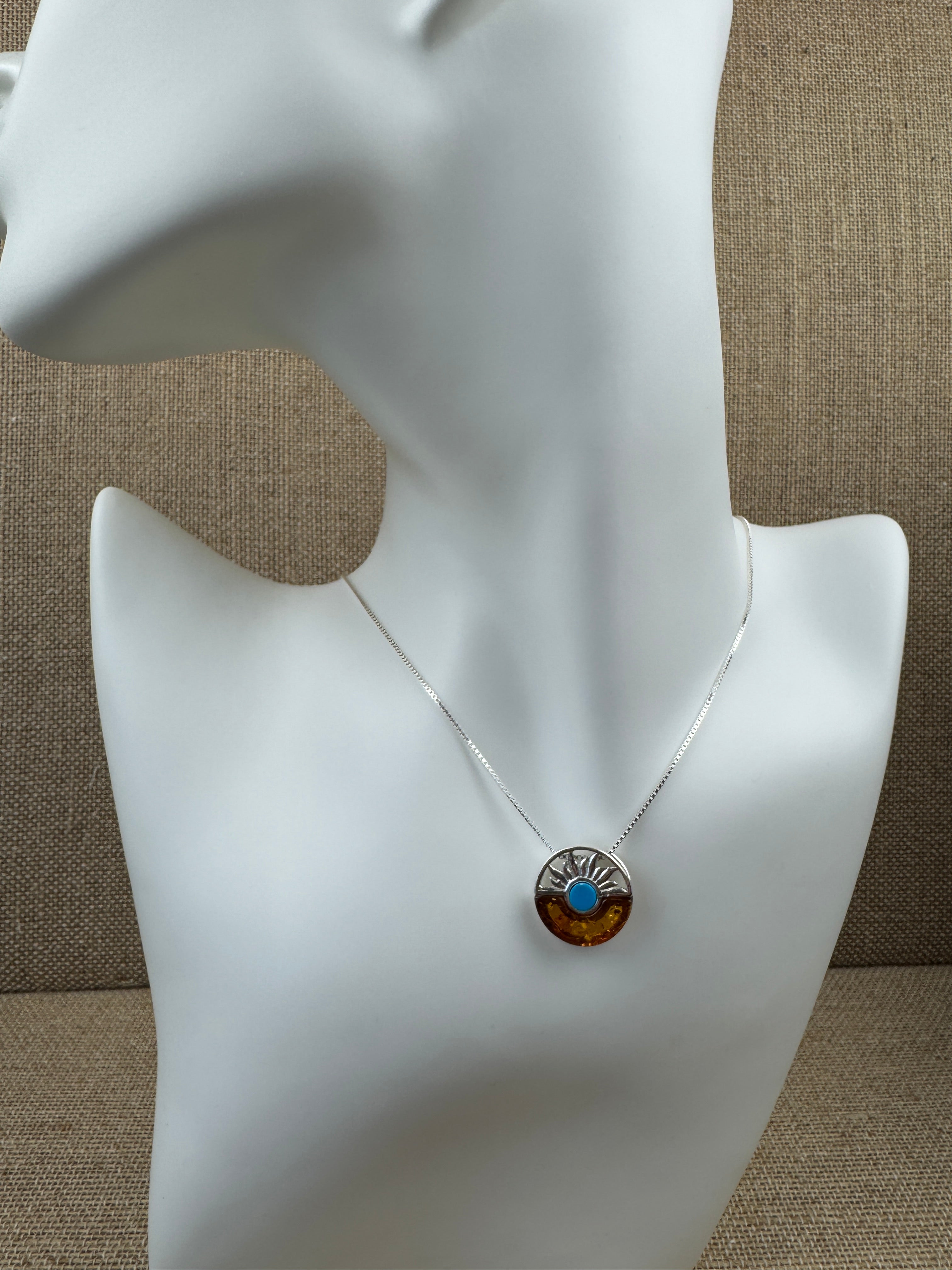 Baltic amber and turquoise pendant on silver chain - A timeless fusion of cultures and nature