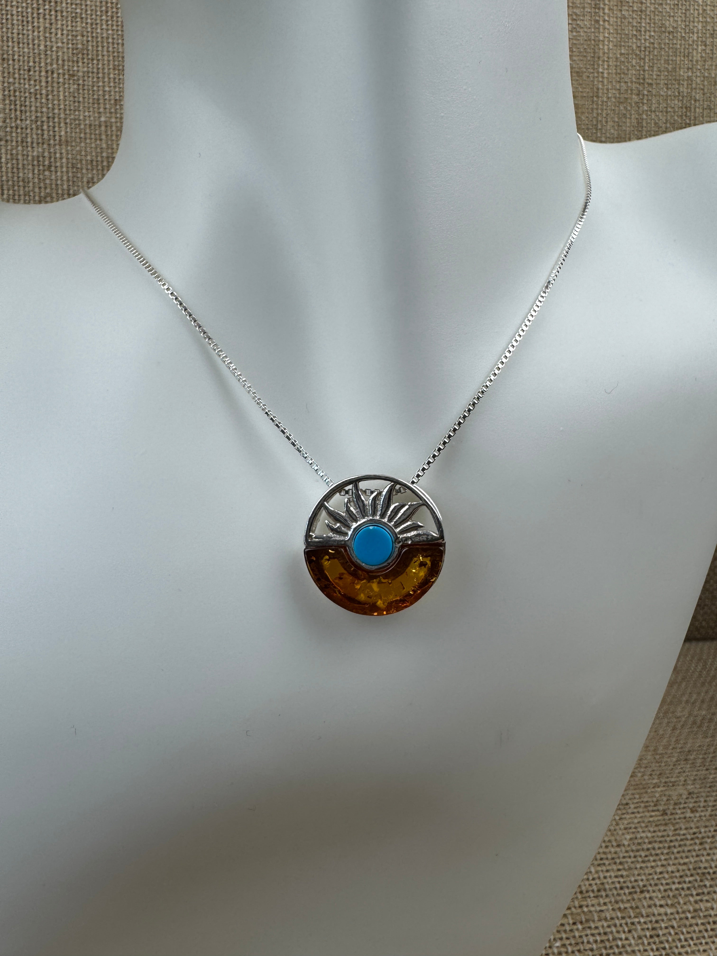 Baltic amber and turquoise pendant on silver chain - A timeless fusion of cultures and nature