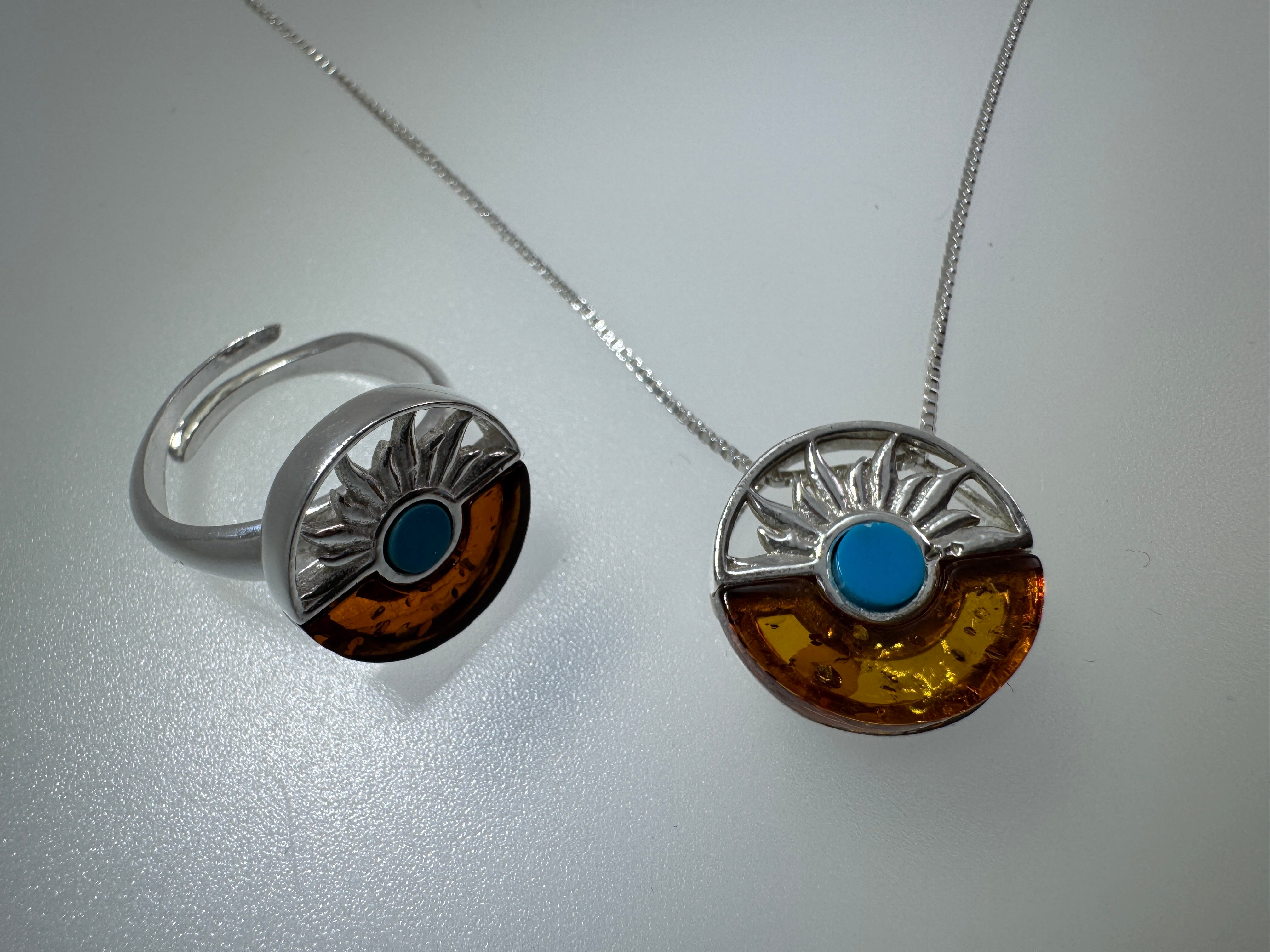 Baltic amber and turquoise pendant on silver chain - A timeless fusion of cultures and nature