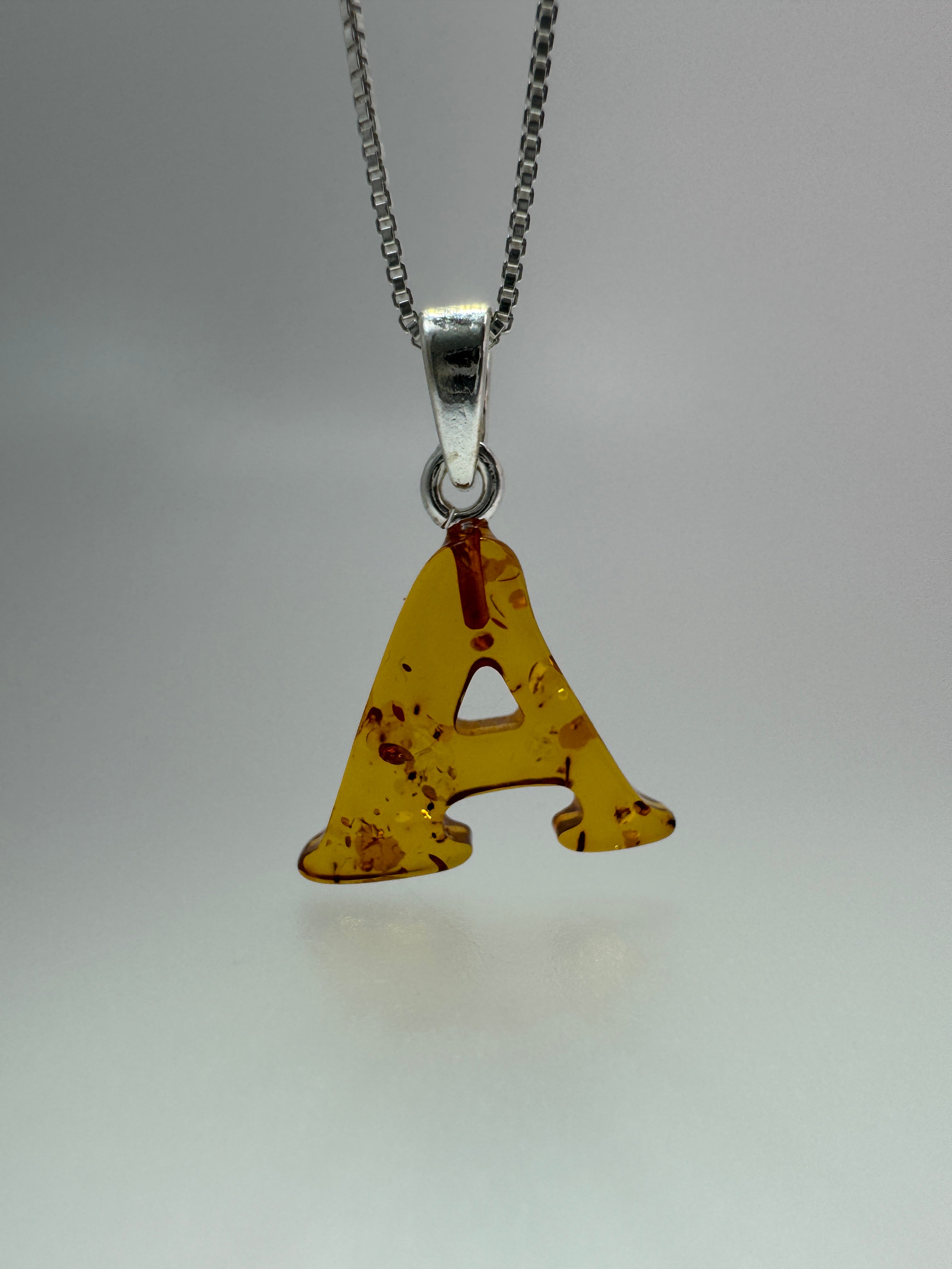 Personalized Baltic Amber Initial Pendant – Handcarved from one stone - shipped on choice of silver chain.