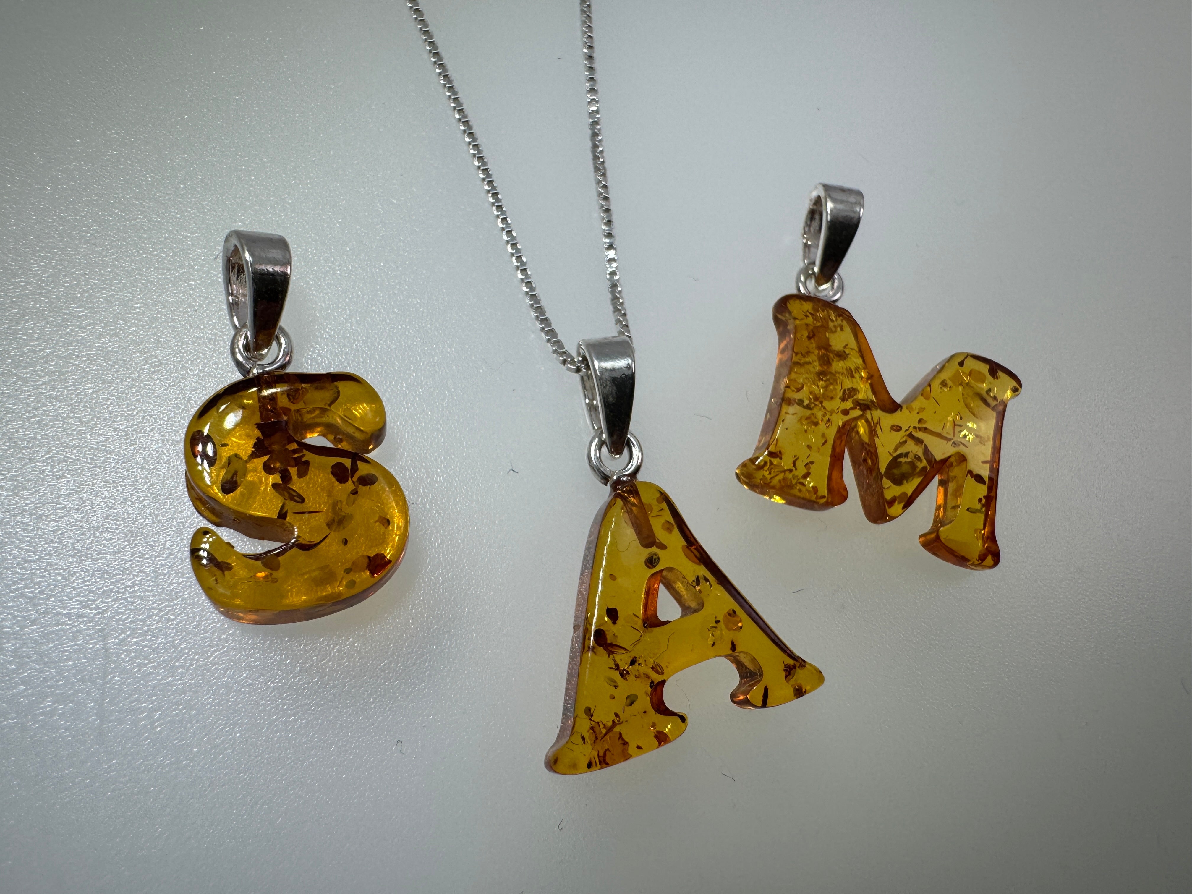 Personalized Baltic Amber Initial Pendant – Handcarved from one stone - shipped on choice of silver chain.