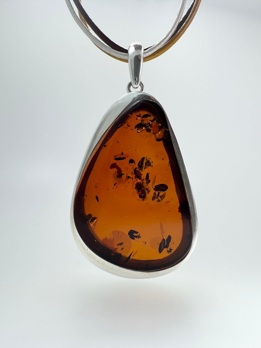 Modern Sterling Silver & Cognac Baltic Amber Pendant Necklace on Multicolor Leather Cord – Handmade in Poland