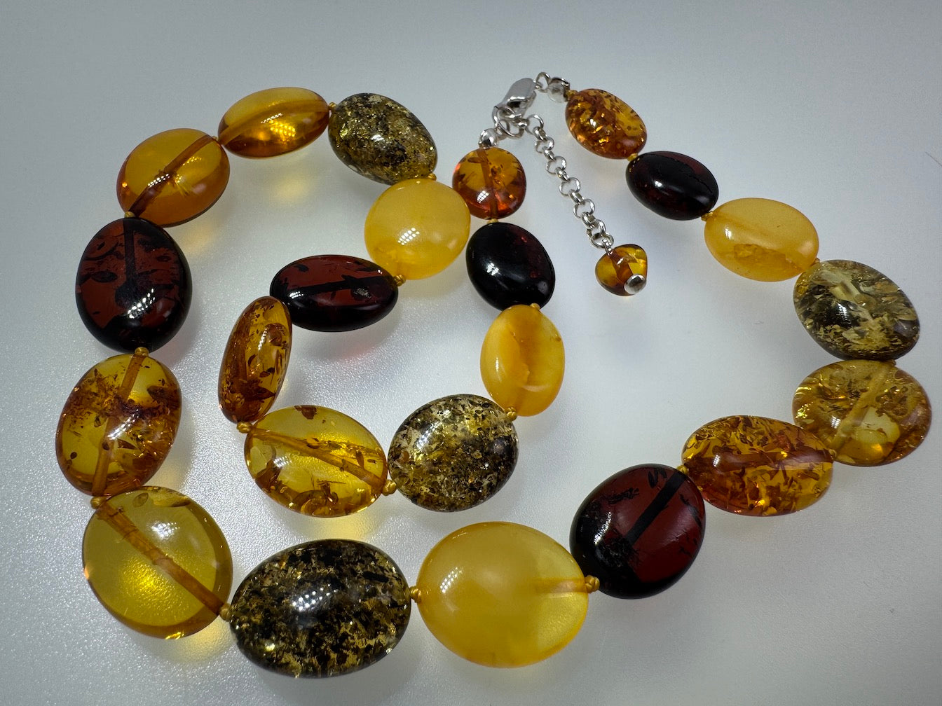 Multicolor Baltic Amber Bead Necklace – Oval Bean Shape, Sterling Silver Closure, Handmade in Lithuania