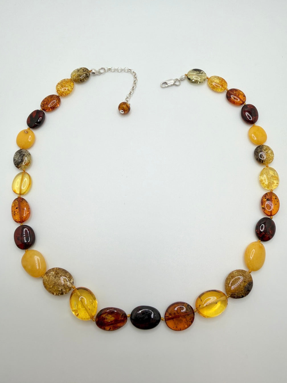 Multicolor Baltic Amber Bead Necklace – Oval Bean Shape, Sterling Silver Closure, Handmade in Lithuania