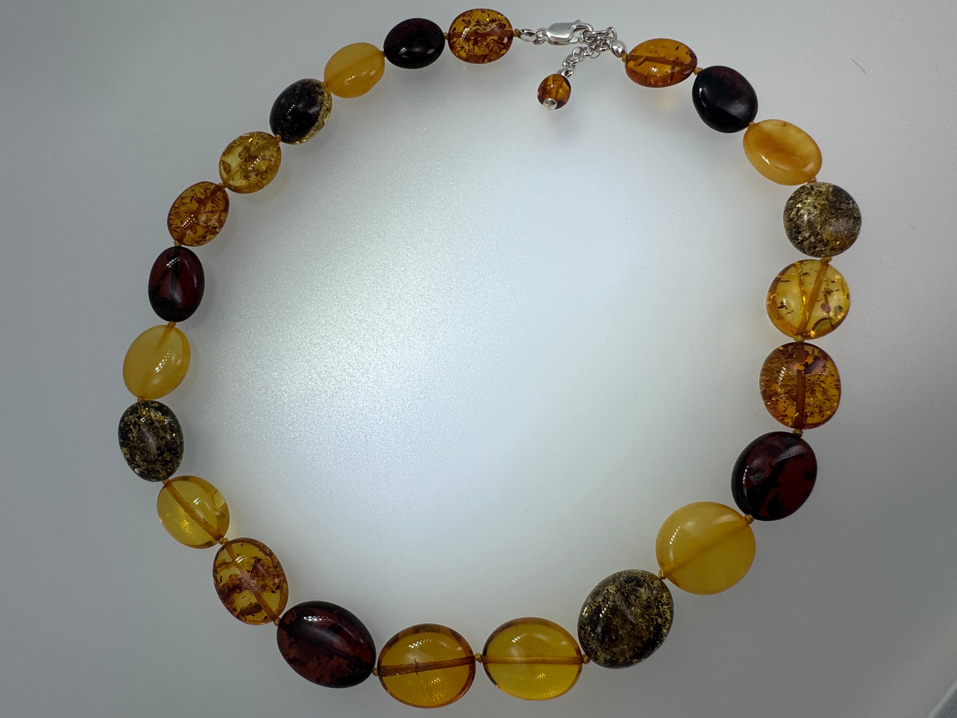 Multicolor Baltic Amber Bead Necklace – Oval Bean Shape, Sterling Silver Closure, Handmade in Lithuania